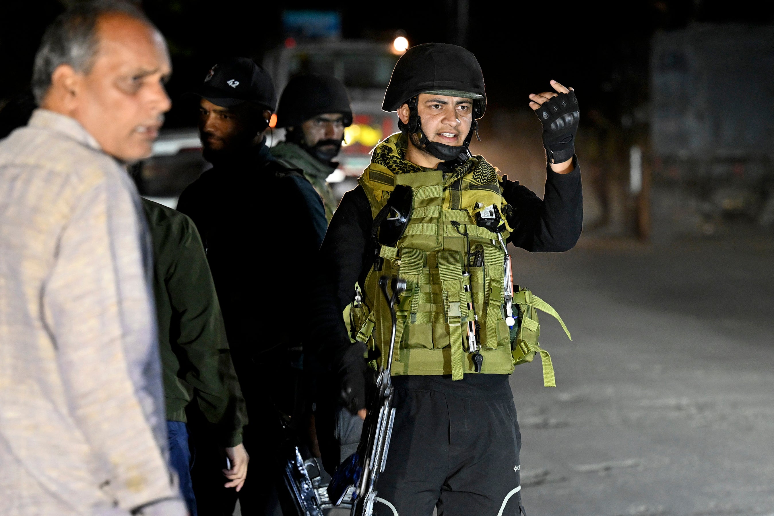 An Indian soldier stands guard near Pahalgam following an attack on tourists on 22 April 2025