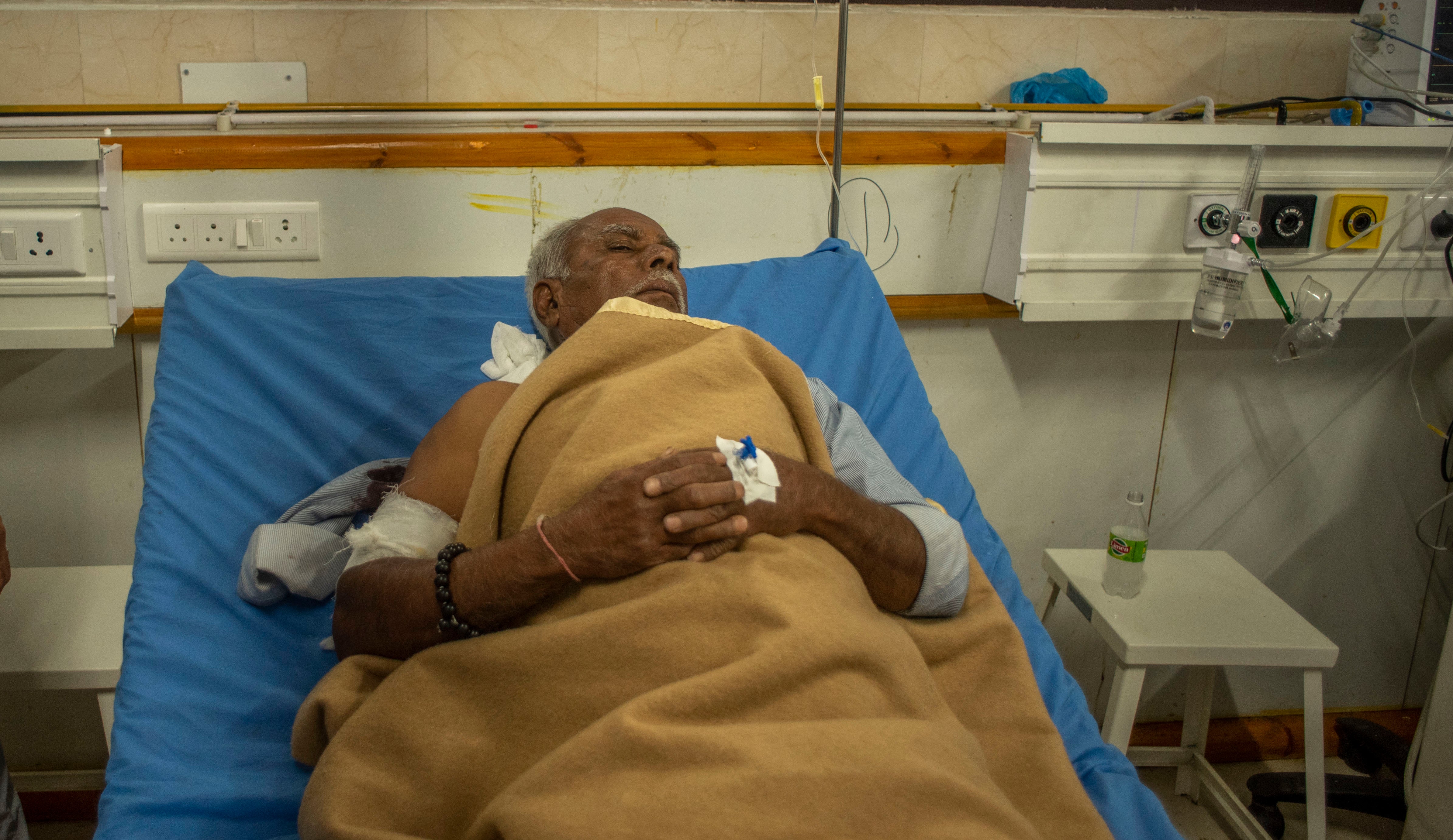 An Indian tourist lies wounded in a hospital bed after gunmen attacked Indian tourists