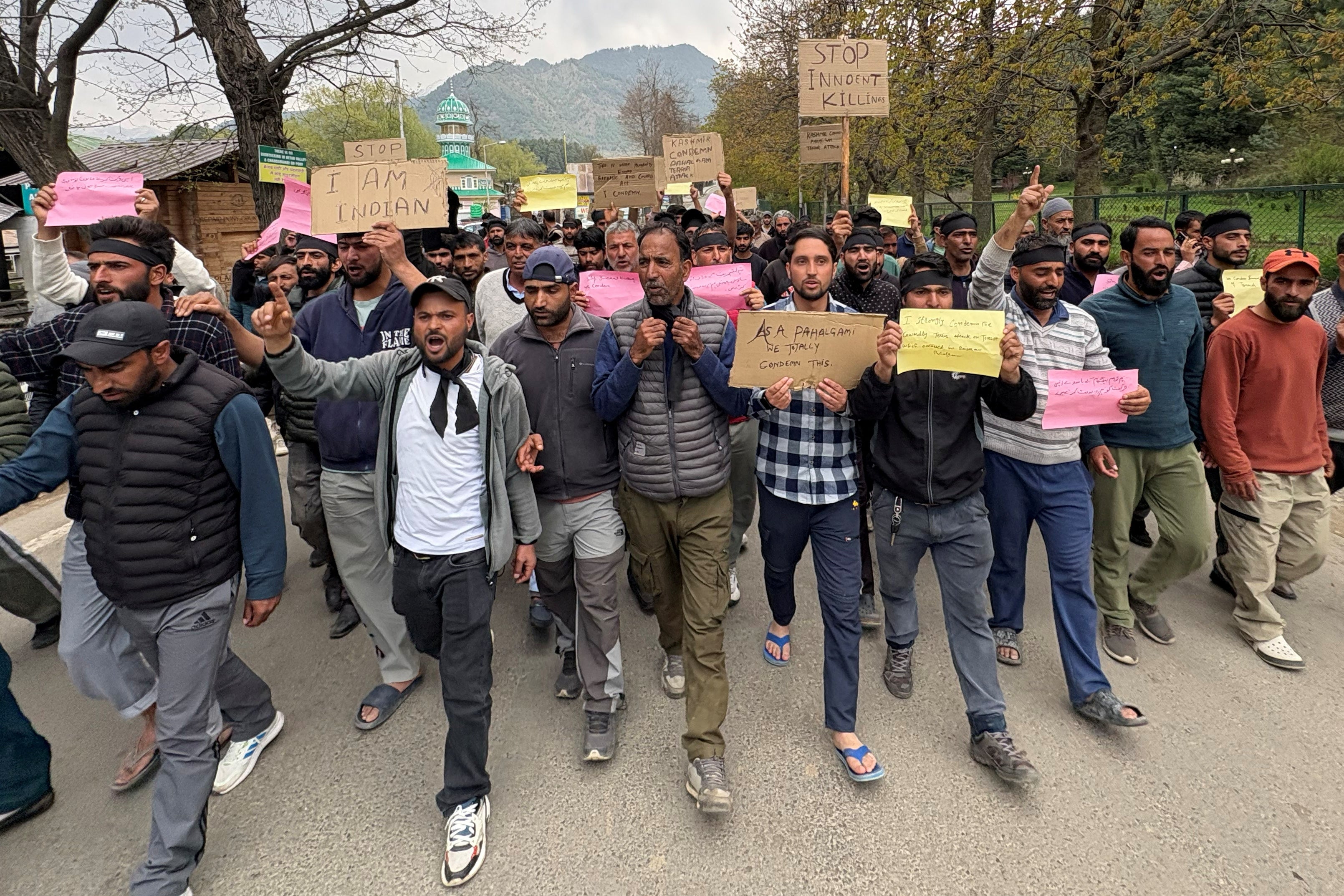 Members of Pahalgam Taxi Owners Association and pony owners shout slogans during a protest on 23 April 2025 against the attack on tourists in south Kashmir