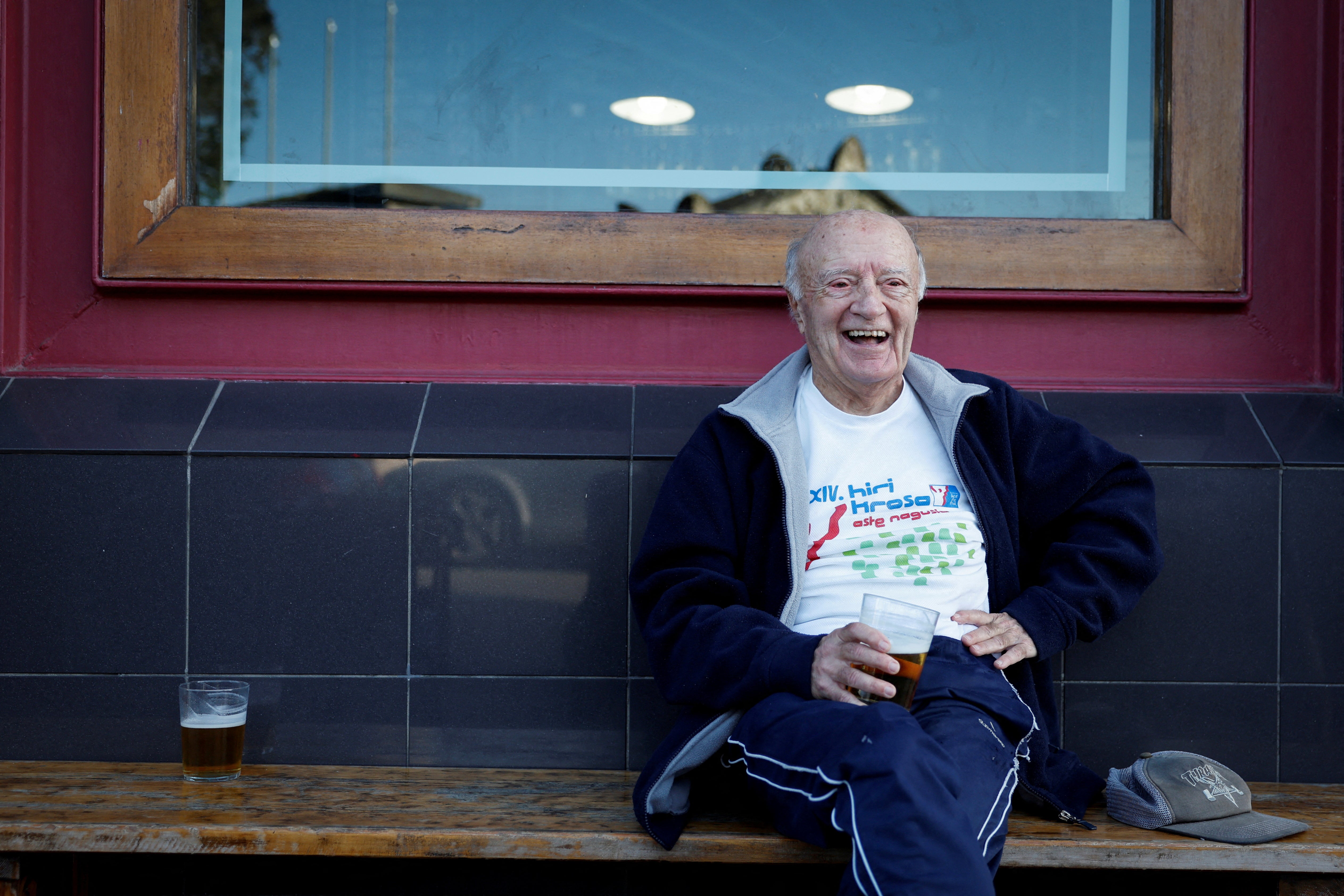Albizu enjoys a cool beer after a skateboarding session at a neighbourhood bar in Bilbao