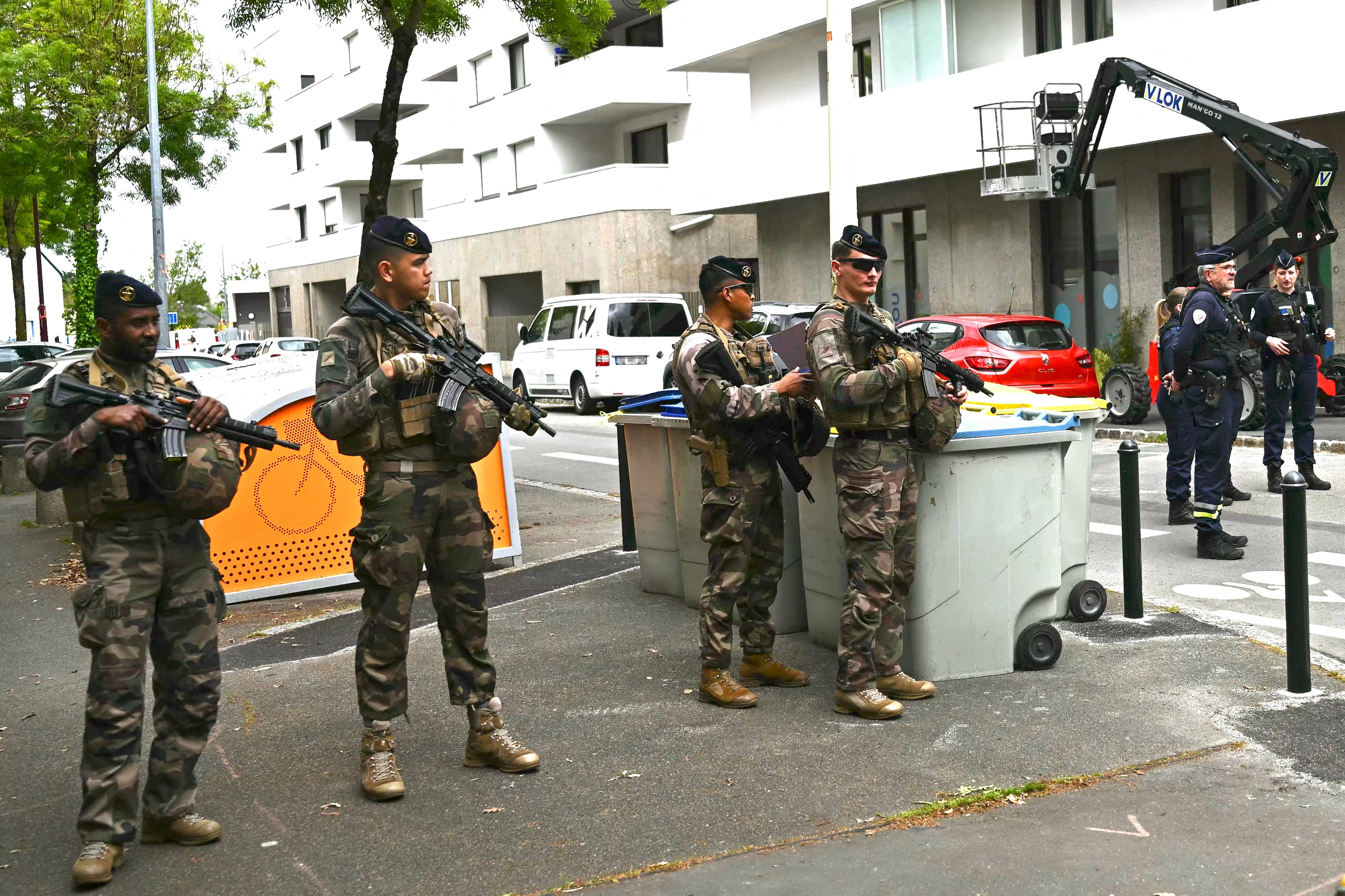 French military officers are also on the scene