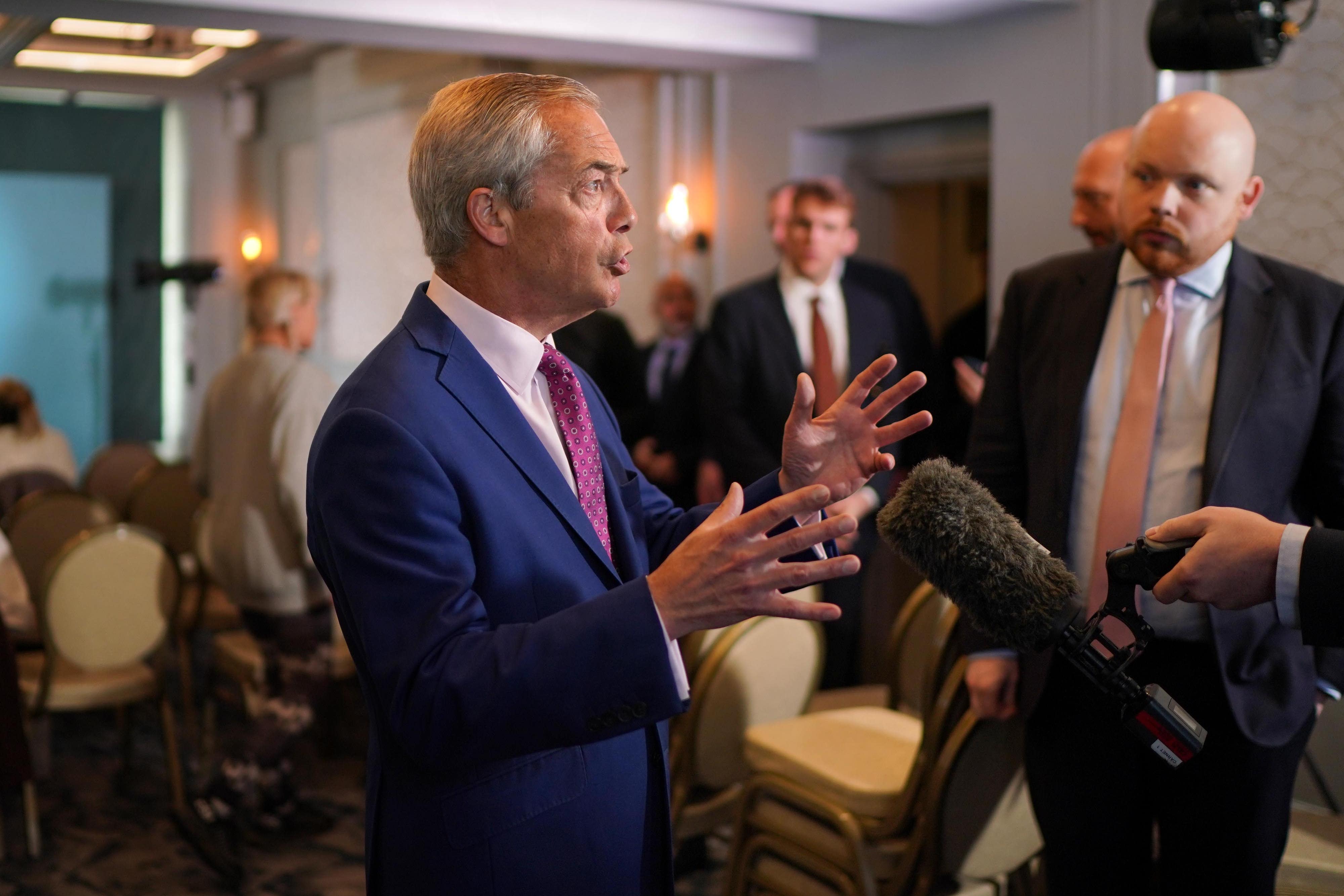 Reform UK leader Nigel Farage speaking to the media after a press conference in Dover in Kent, while on the local election campaign trail (Gareth Fuller/PA)