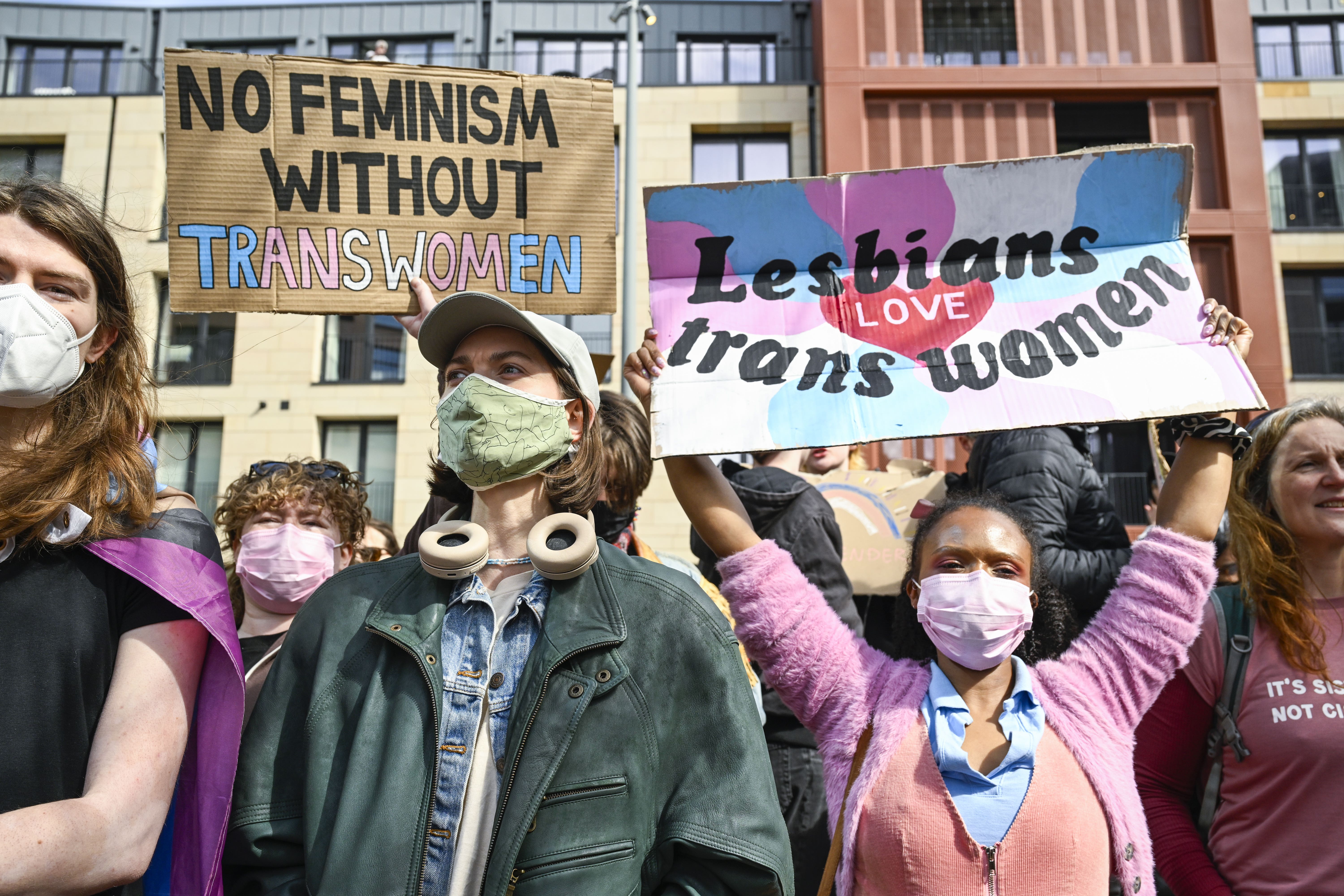 Protesters at a trans rights rally outside Queen Elizabeth House, the UK Government building in Edinburgh (Lesley Martin/PA)