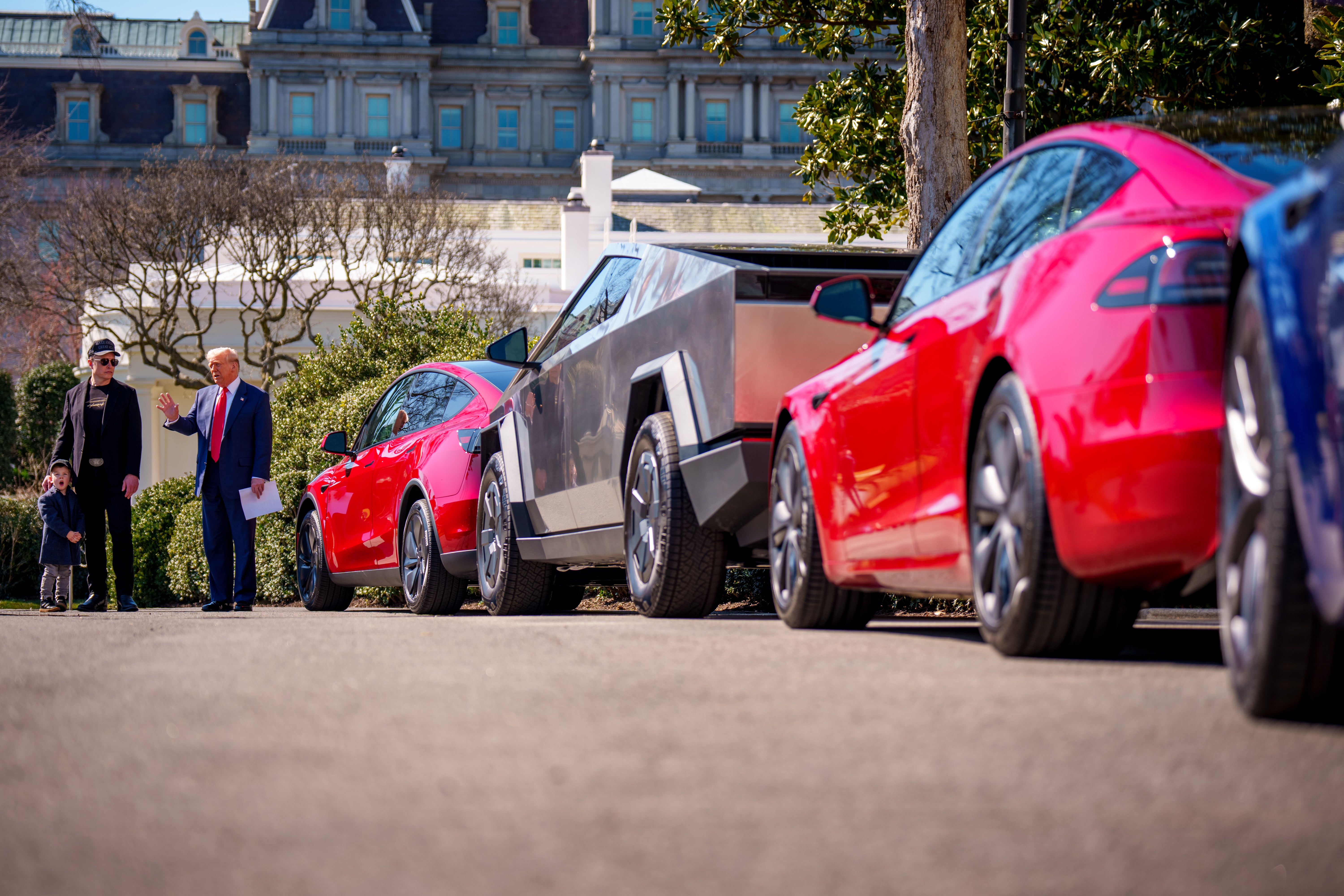 Another presidential press conference/ photo-op took place outside the White House, where a line of products from electric vehicle manufacturer Tesla were parked along the South Lawn