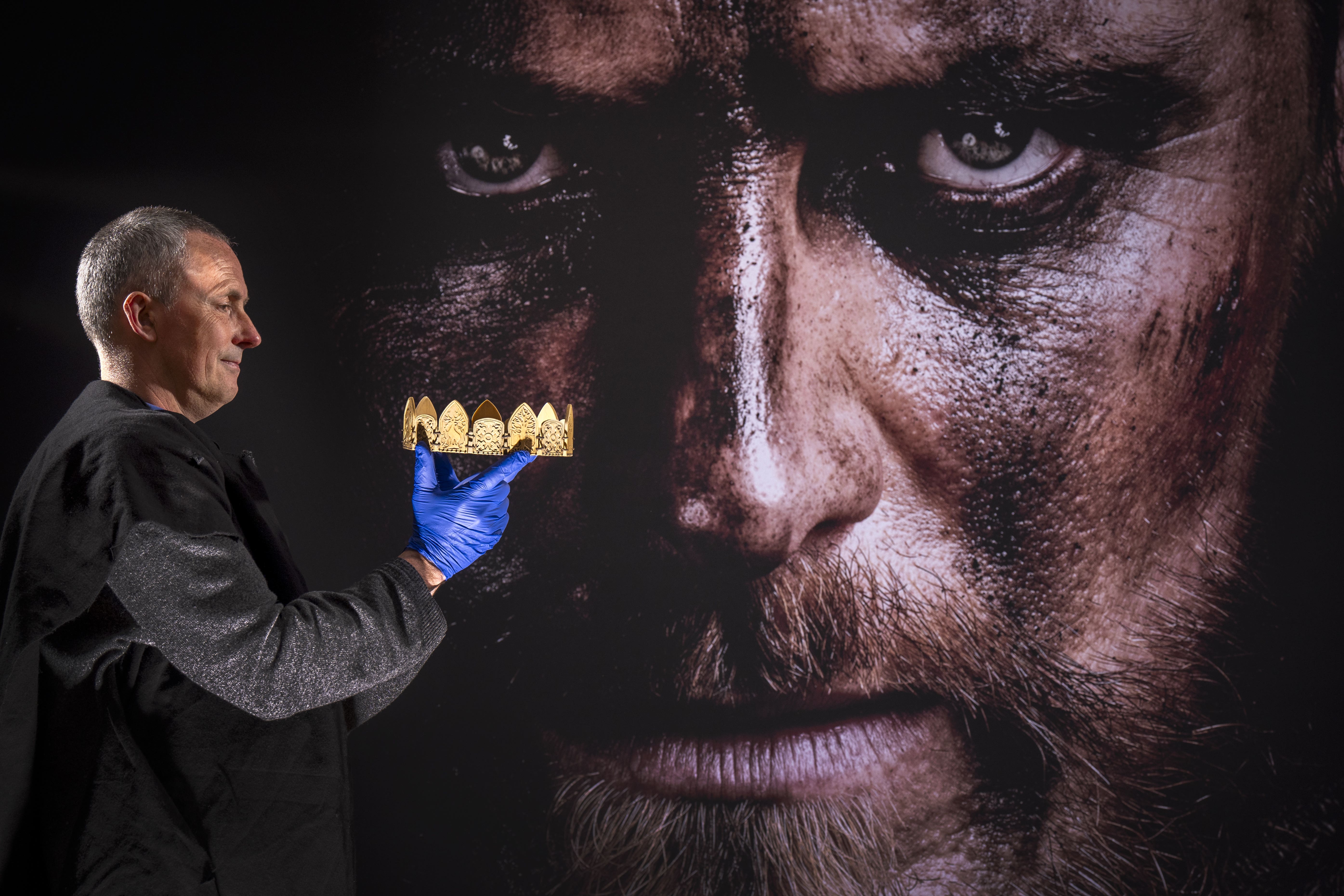 Andrew Wallace takes a closer look at the crown worn by actor Michael Fassbender in the film Macbeth (Jane Barlow/PA)