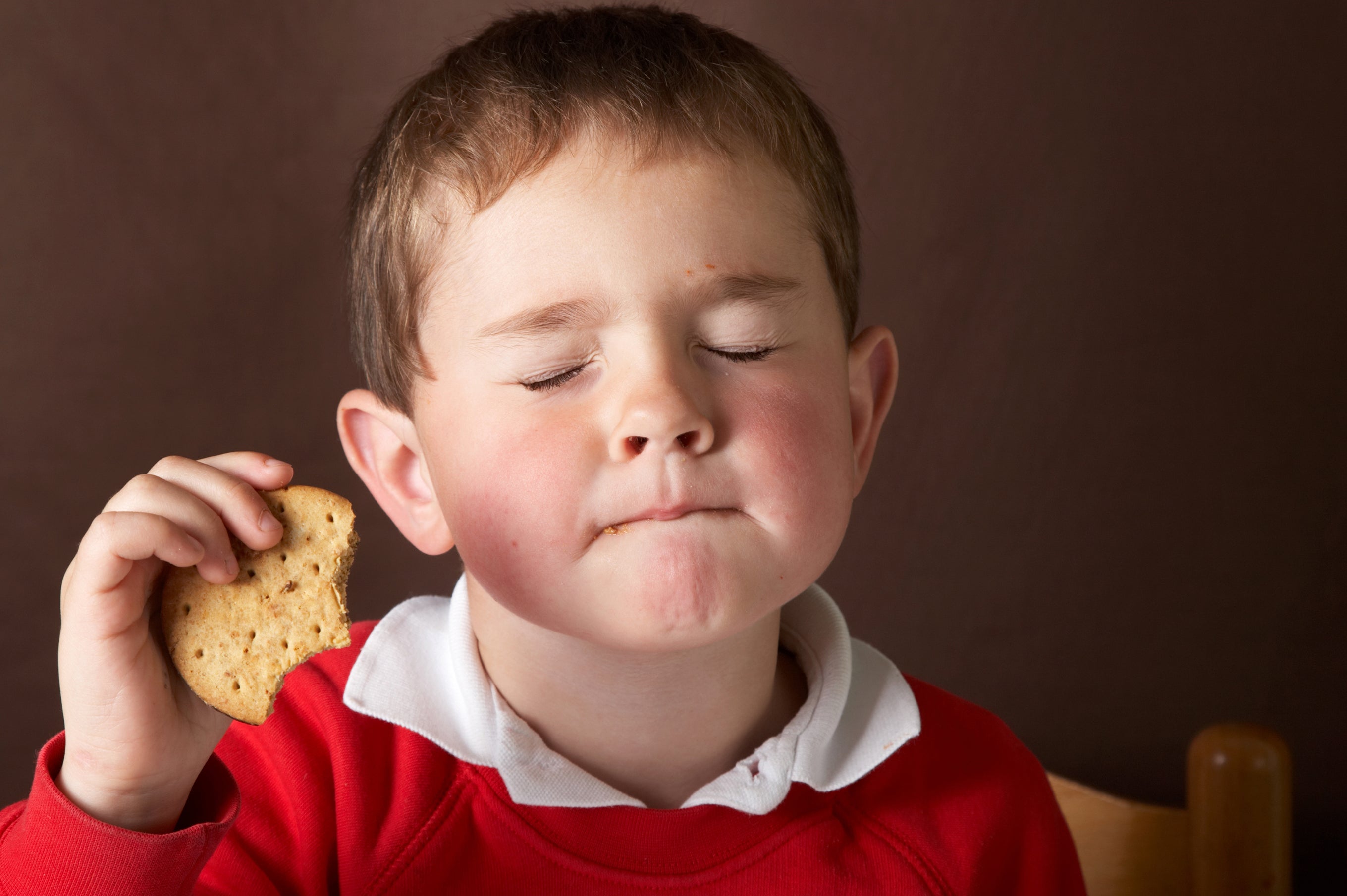 Chocolate-side-down may have been the intended way to eat chocolate digestives from the beginning