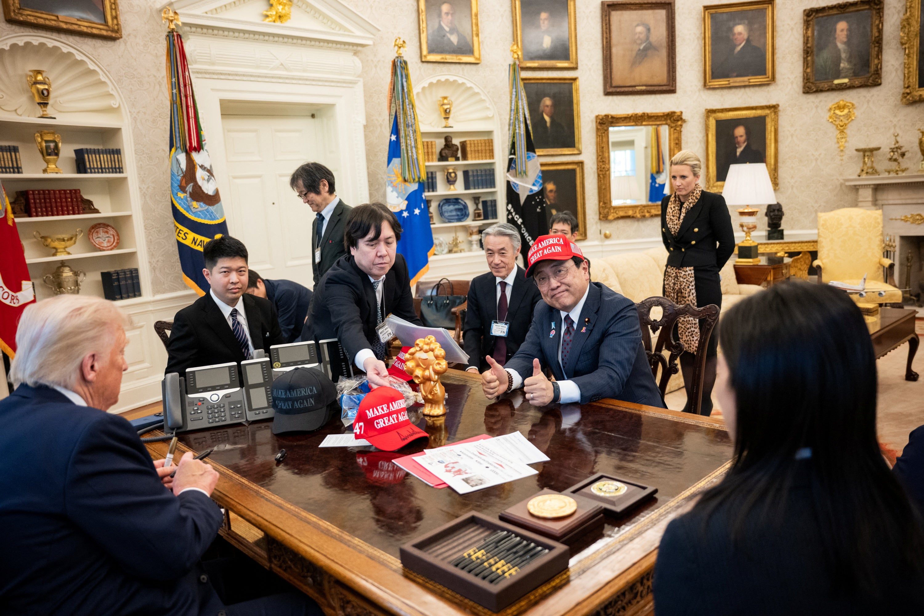 Donald Trump meets with a Japanese trade delegation including economic revitalisation minister Ryosei Akazawa at the White House on 25 April this year