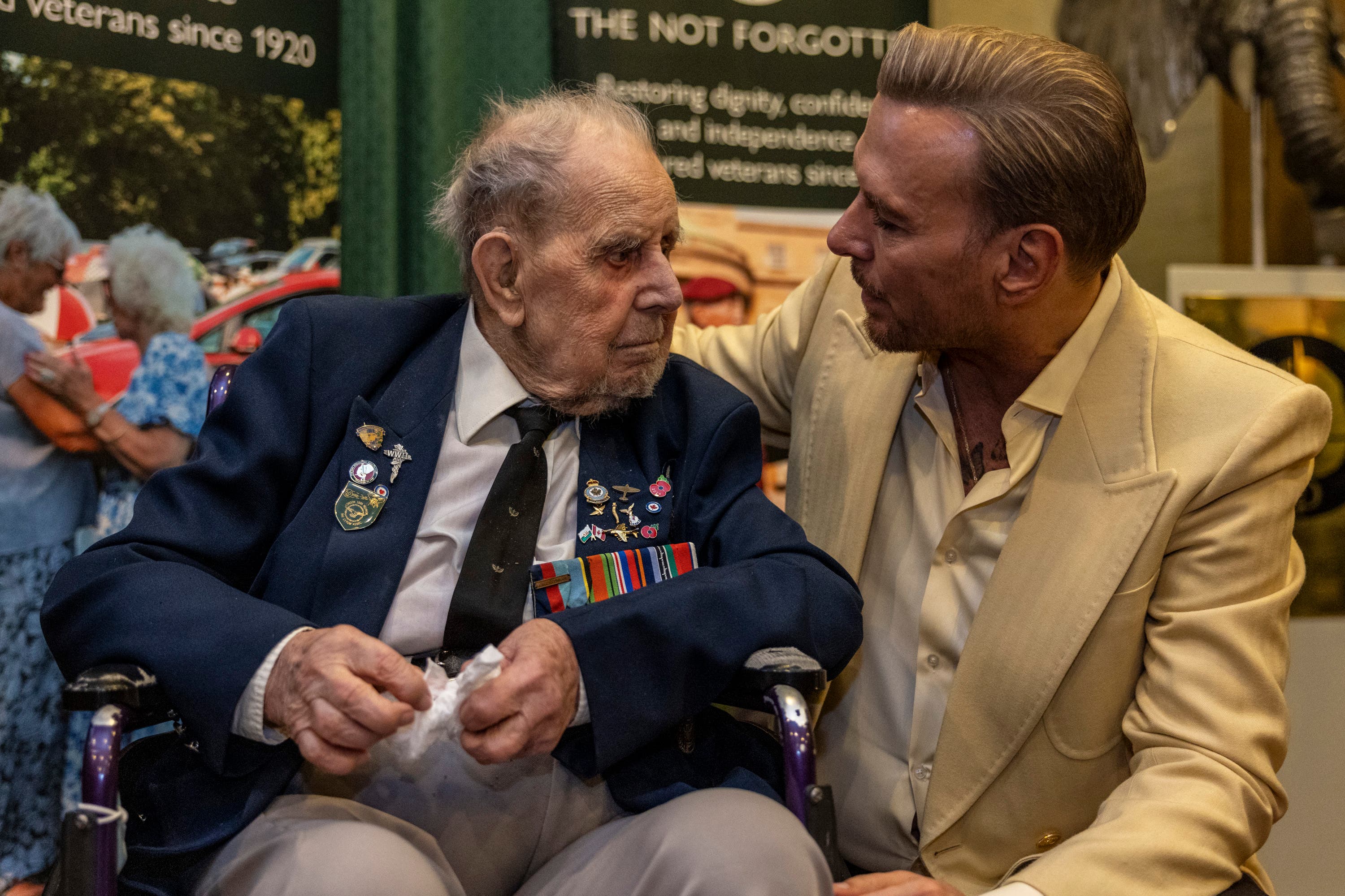 Second World War veteran Harry Winter, 102, with Matt Goss (Schmooly/The Not Forgotten/PA)