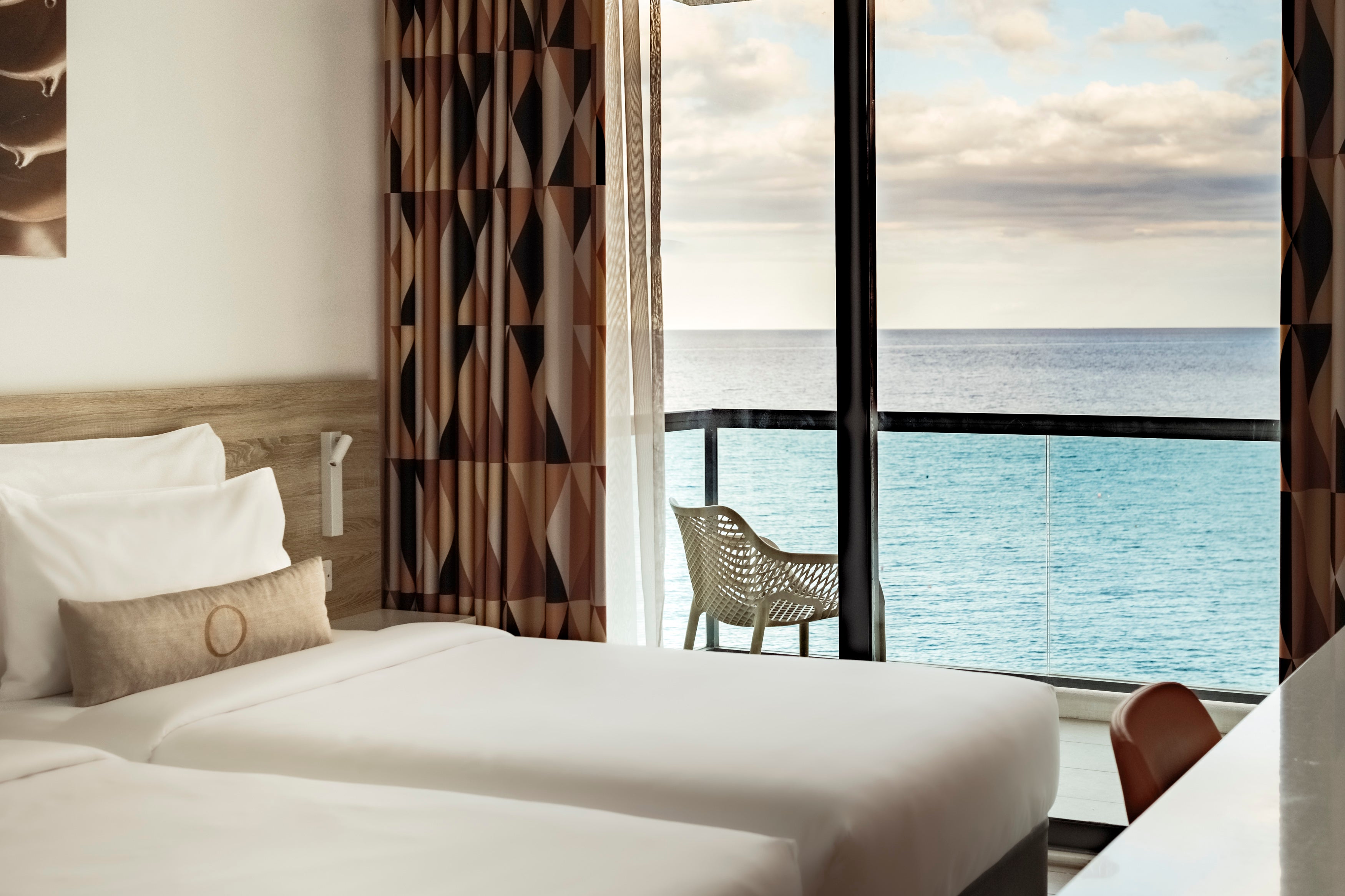 Check into AX ODYCY for views of the clear Mediterranean Sea