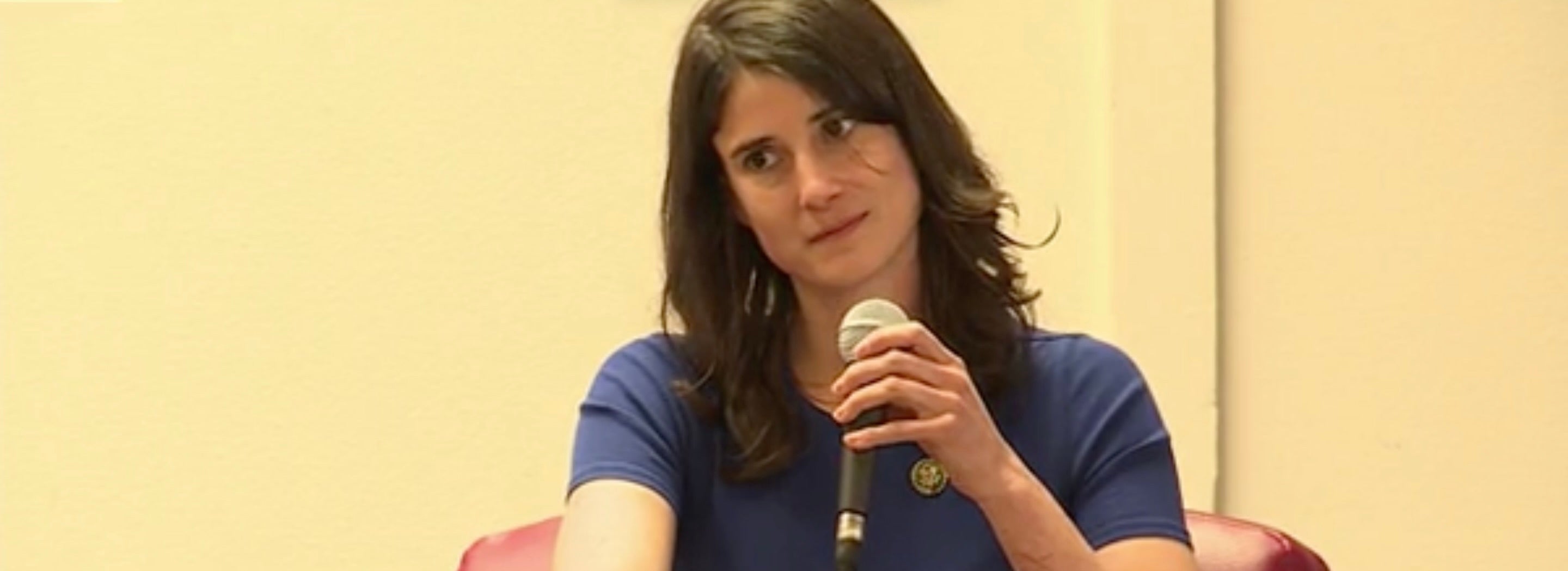 Marie Gluesenkamp Perez struggles to speak over boos during a town hall Thursday