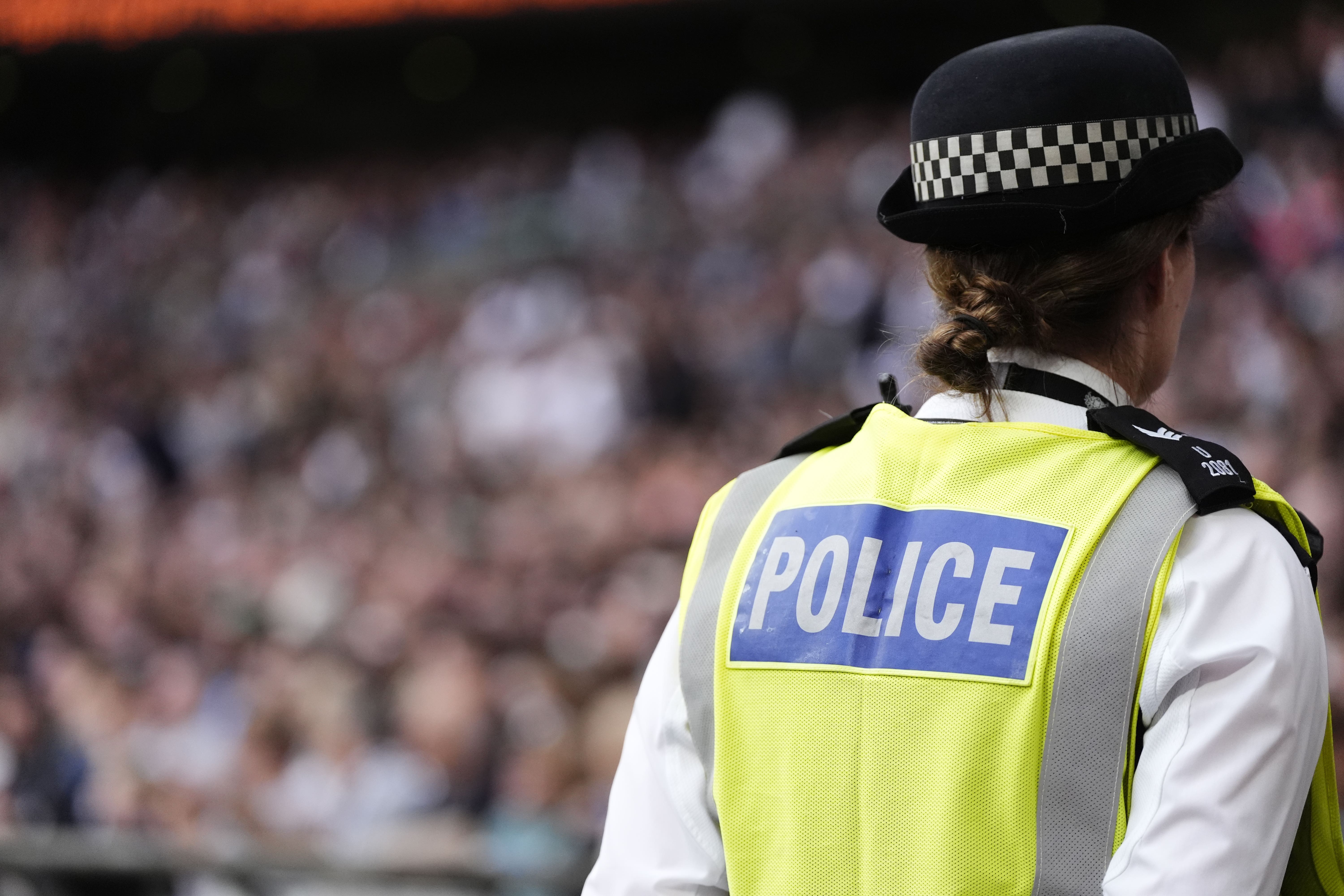 Police keeping watch over fans during the Vanarama National League play-off final at Wembley Stadium, London (PA)