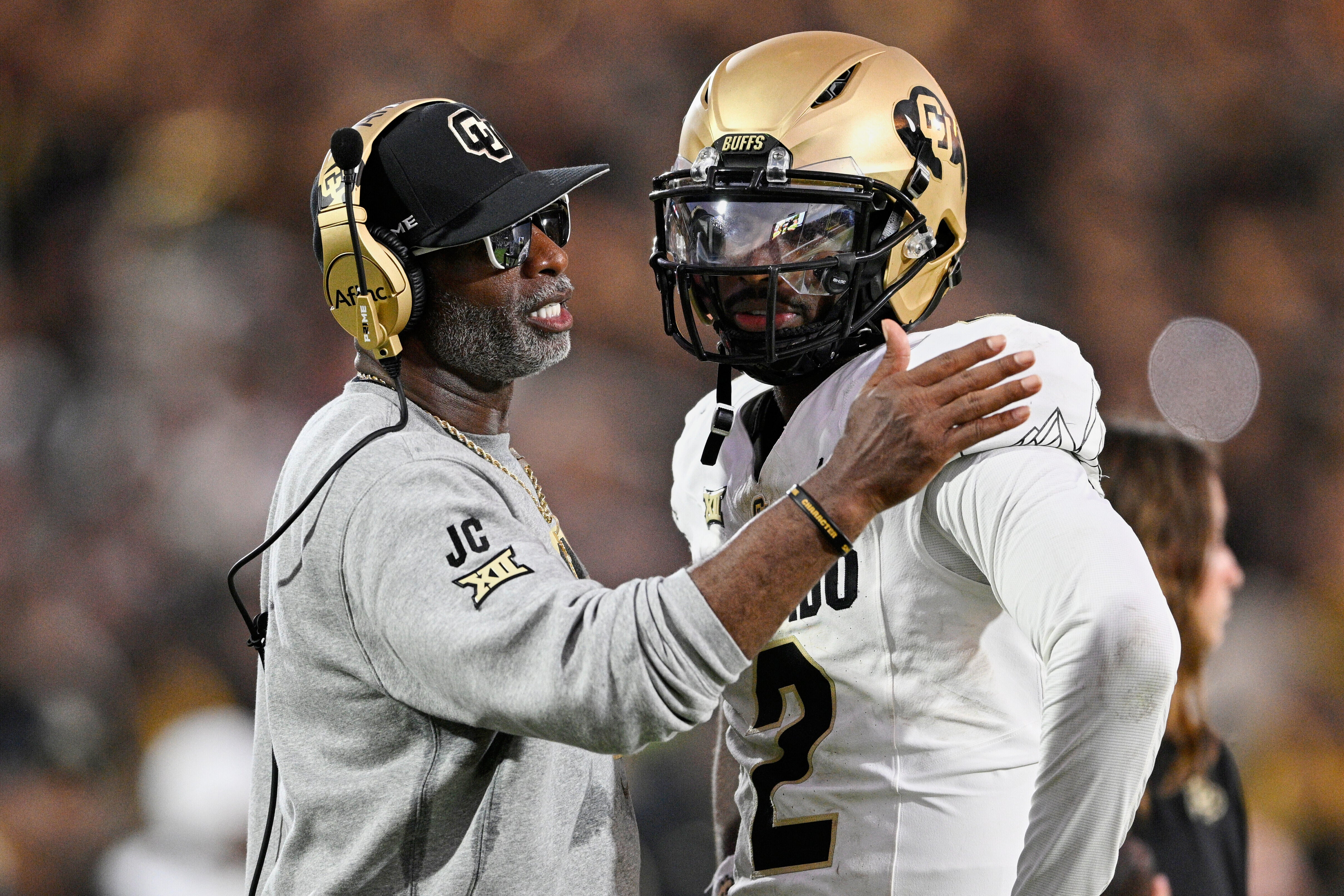 <p>Shedeur Sanders (right) was coached by Deion, his father, at Colorado</p>