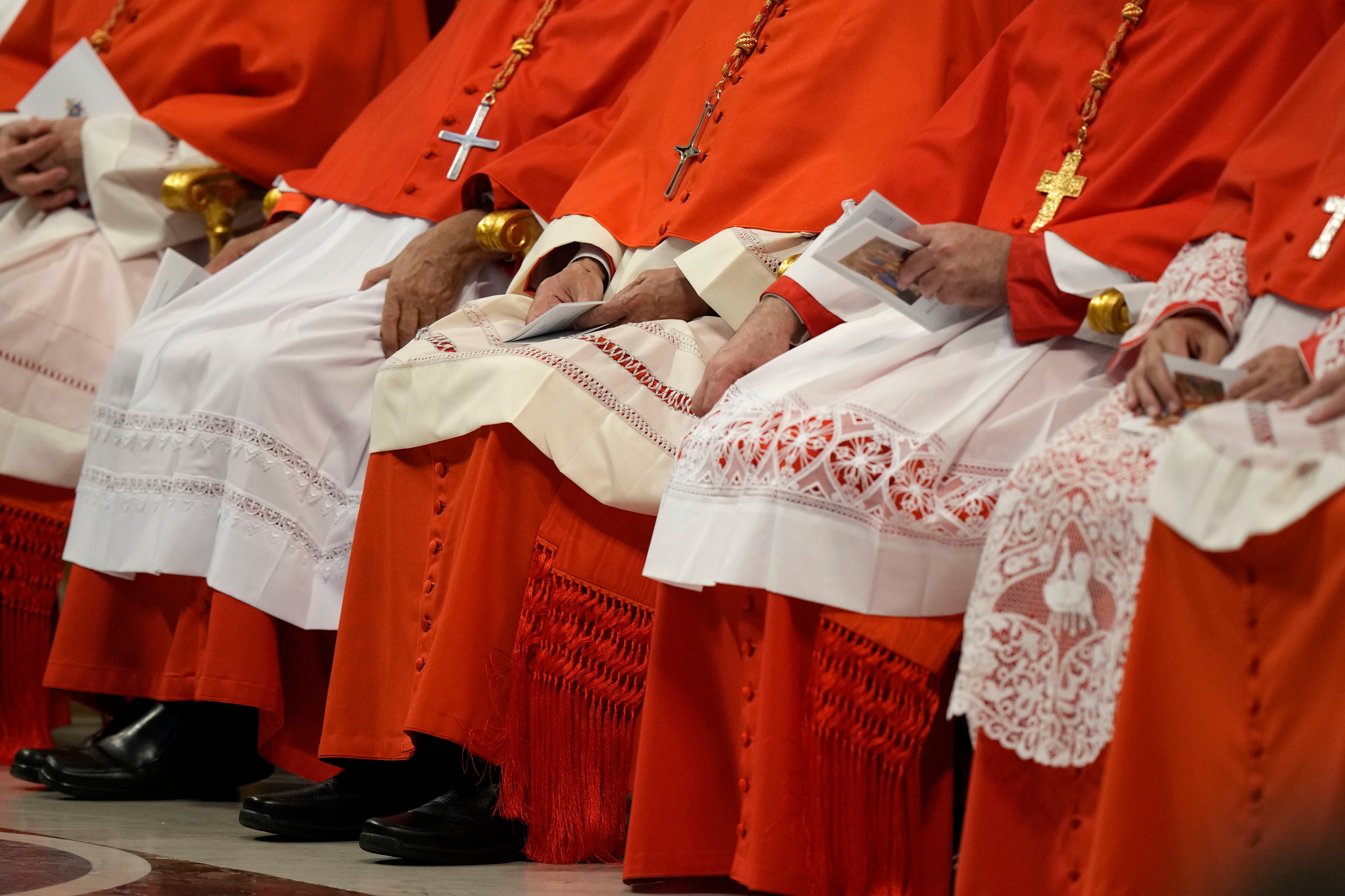 Attention has turned to the conclave of cardinals who will elect the next pope