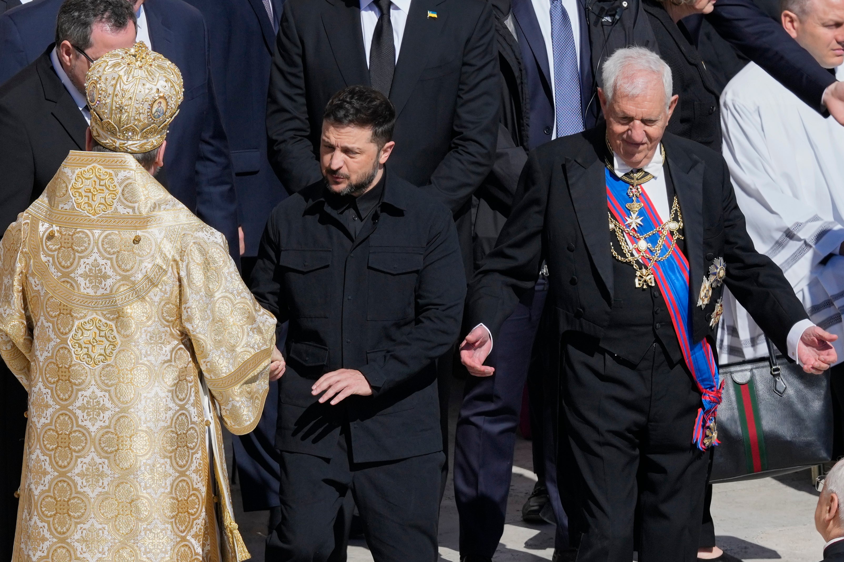 Ukraine’s President Volodymr Zelensky was applauded as he arrived for the funeral (Gregorio Borgia/AP)