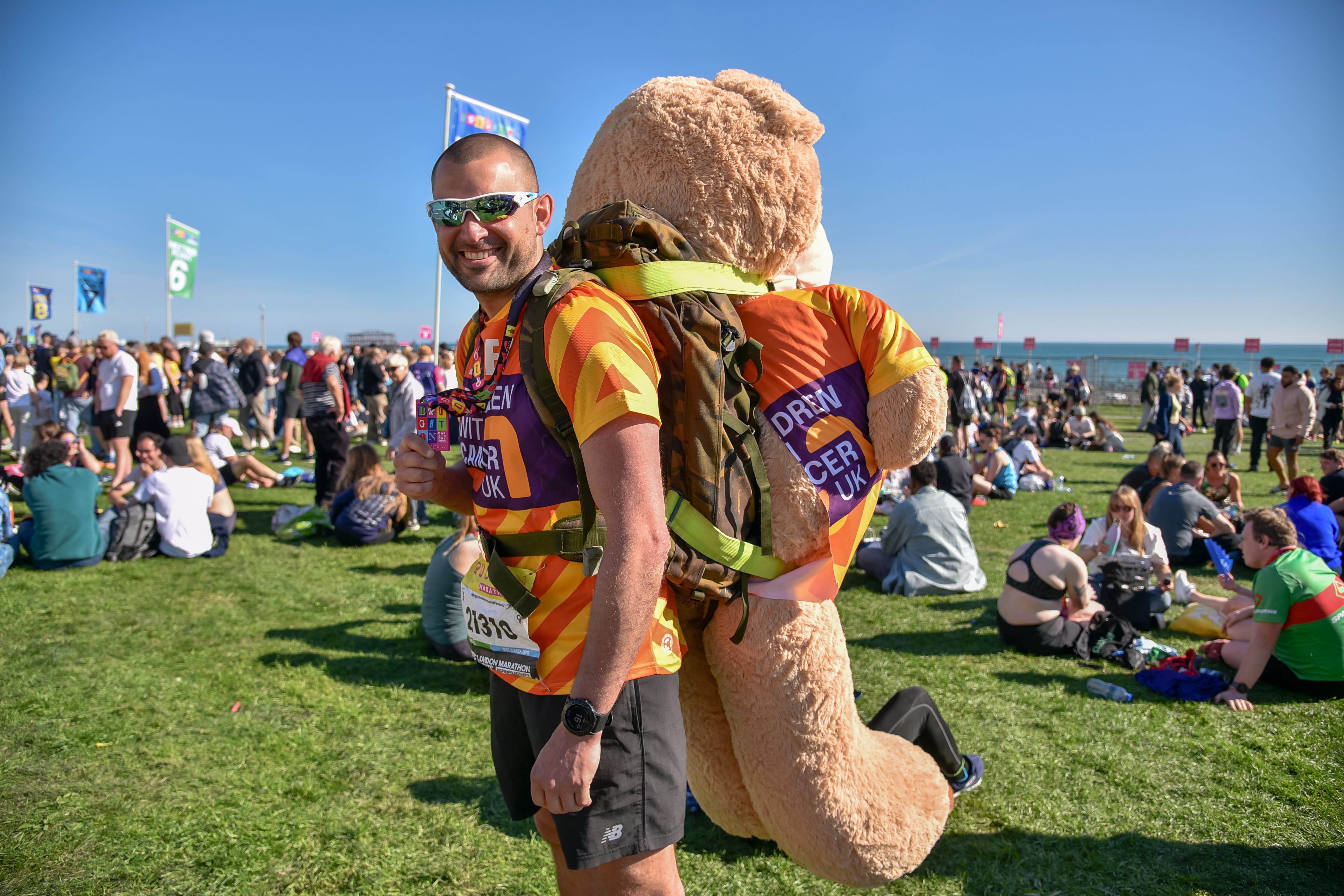 James Page will run the TCS London Marathon carrying Brave, a two metre tall bear which weighs 10kg (Handout/PA)