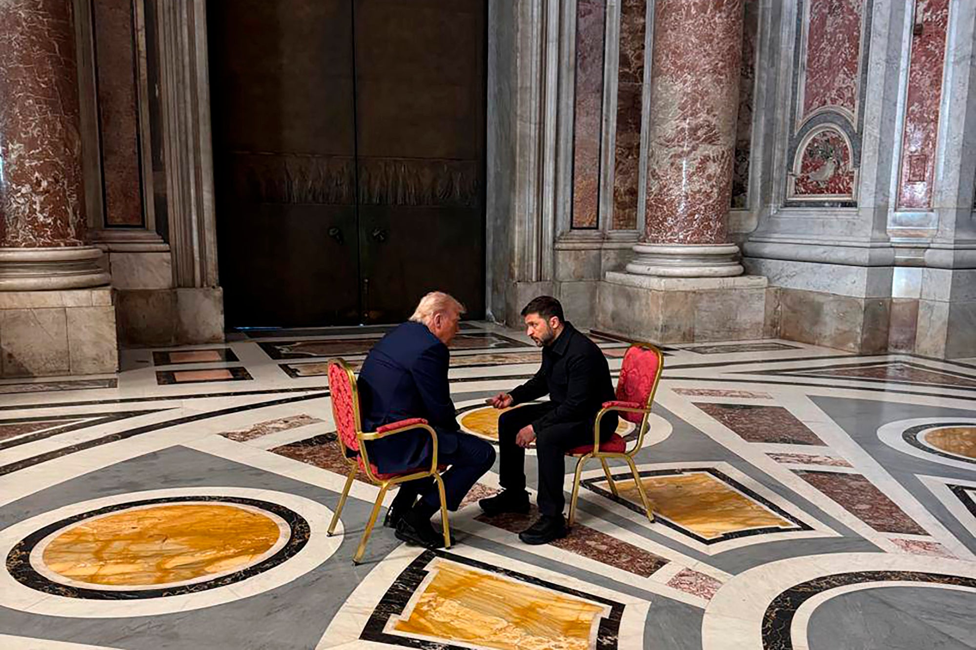 Ukraine’s President Volodymyr Zelensky, right, and US President Donald Trump, talk before the funeral of Pope Francis (Ukrainian Presidential Press Office via AP)