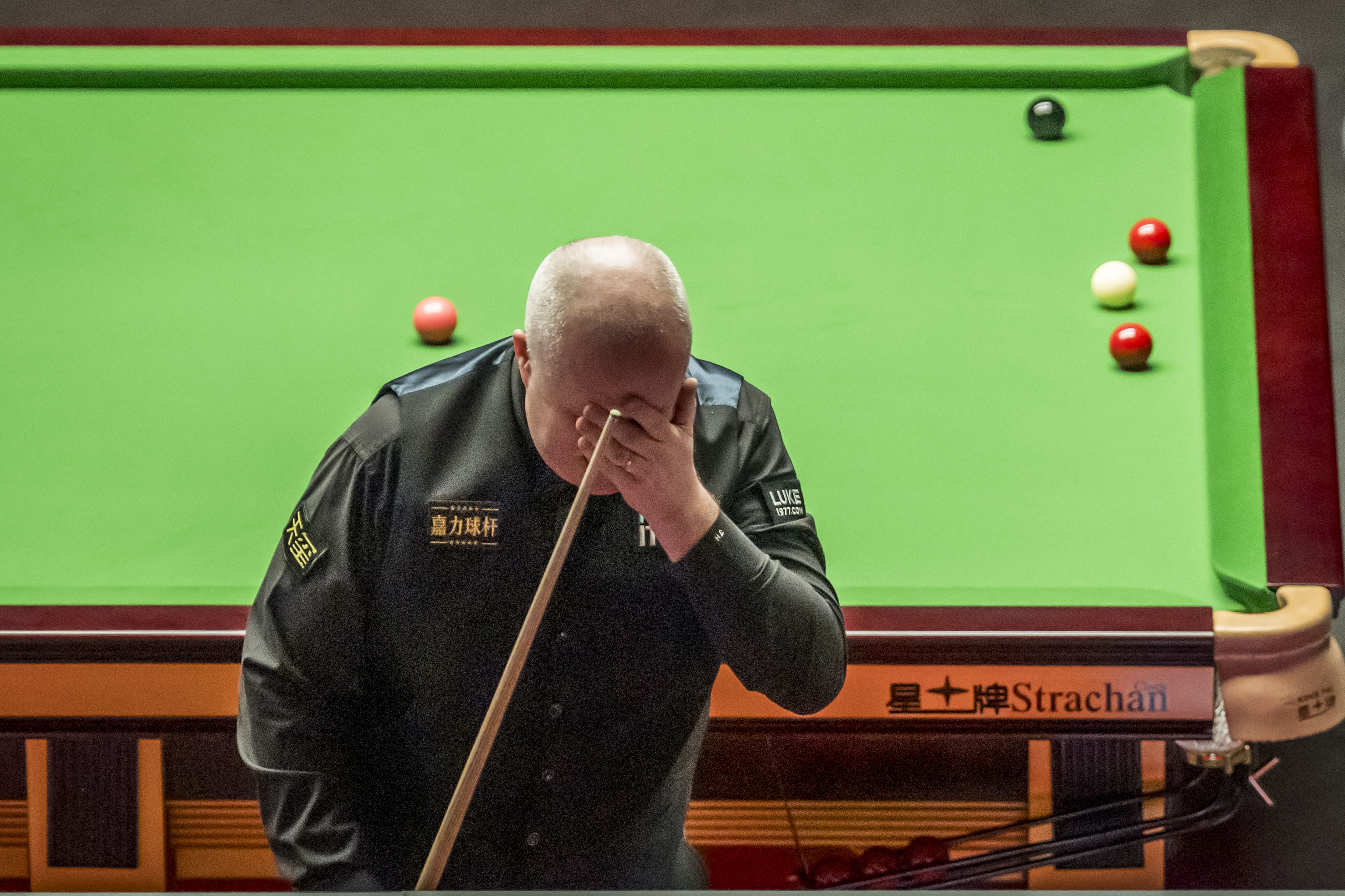 John Higgins will have to wait to clinch his quarter-final spot (Danny Lawson/PA)