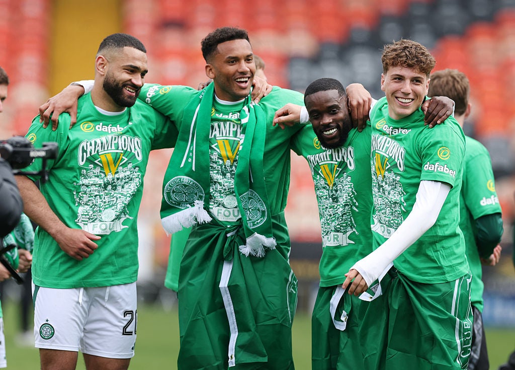 Celtic thrashed Dundee United 5-0 to seal their 13th title in 14 seasons