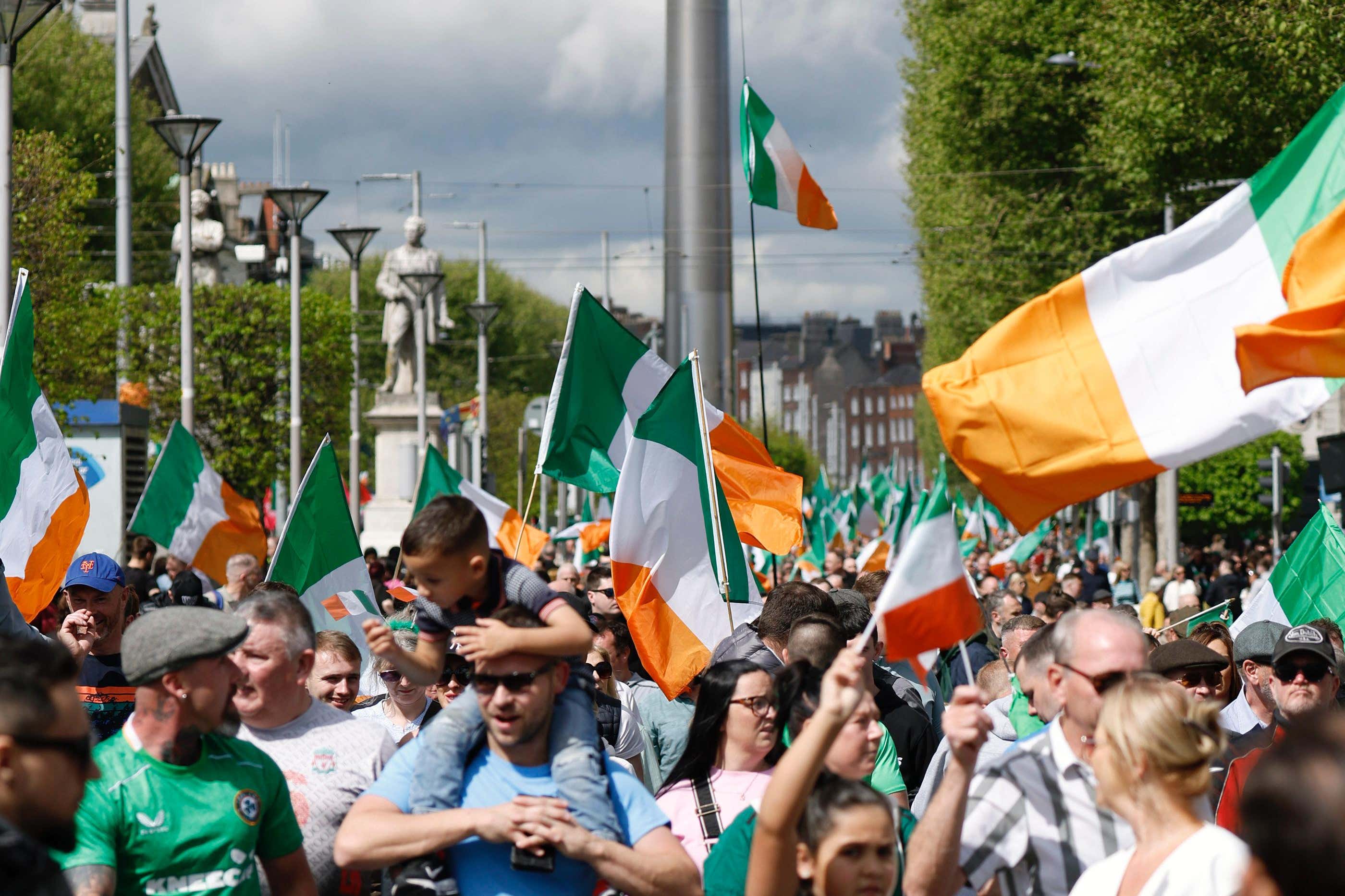 Protesters marching down O’Connell Street (Conor O Mearain/PA)