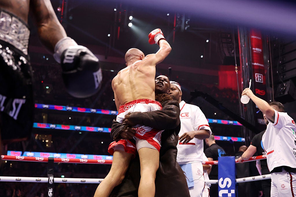 Chris Eubank Jr celebrates with Chris Eubank