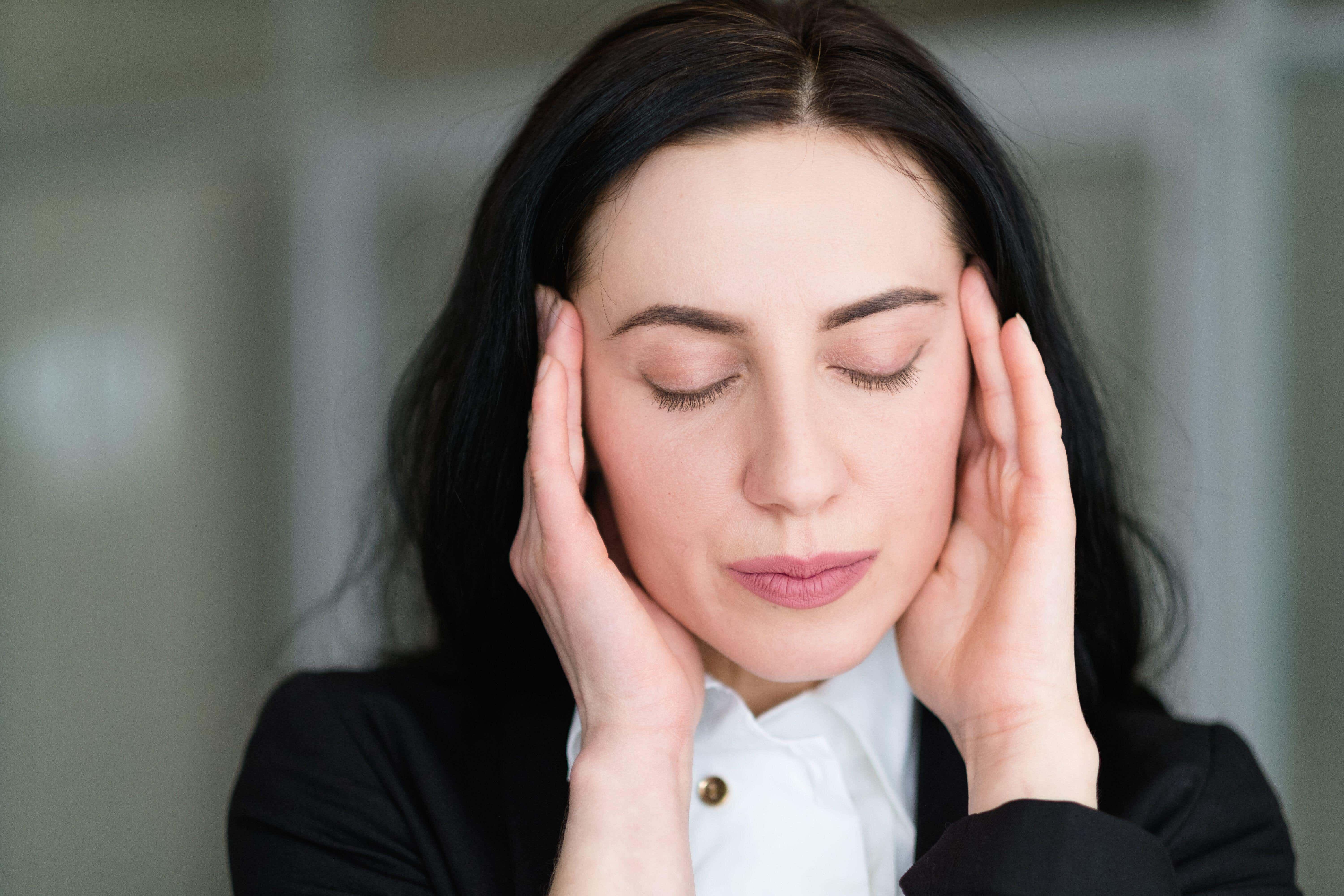 A tired woman (Alamy/PA)