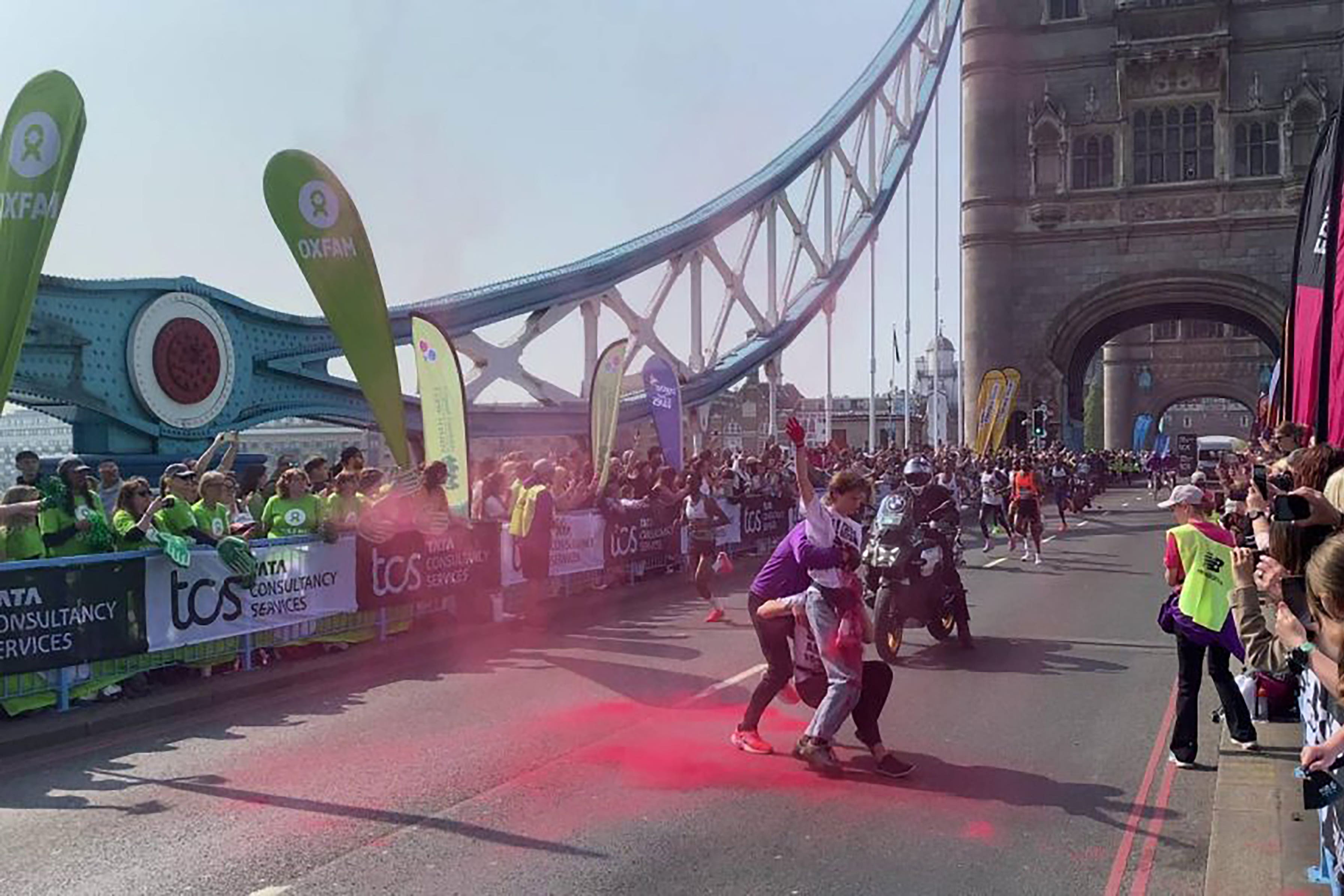 Youth Demand said two of its supporters jumped over the barriers and threw the substance in front of the men’s elite race at around 10.35am