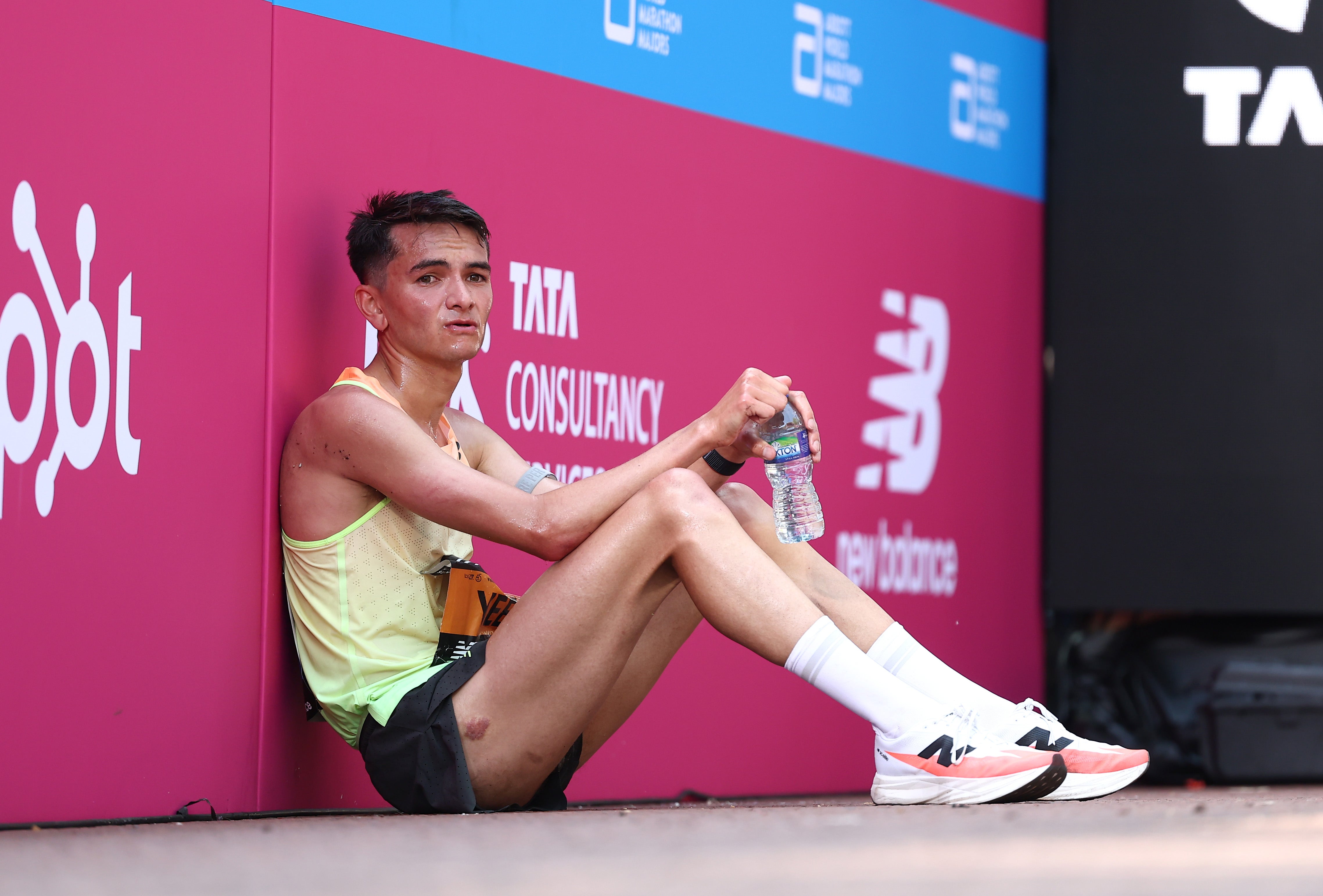 Alex Yee reacts at the finish line