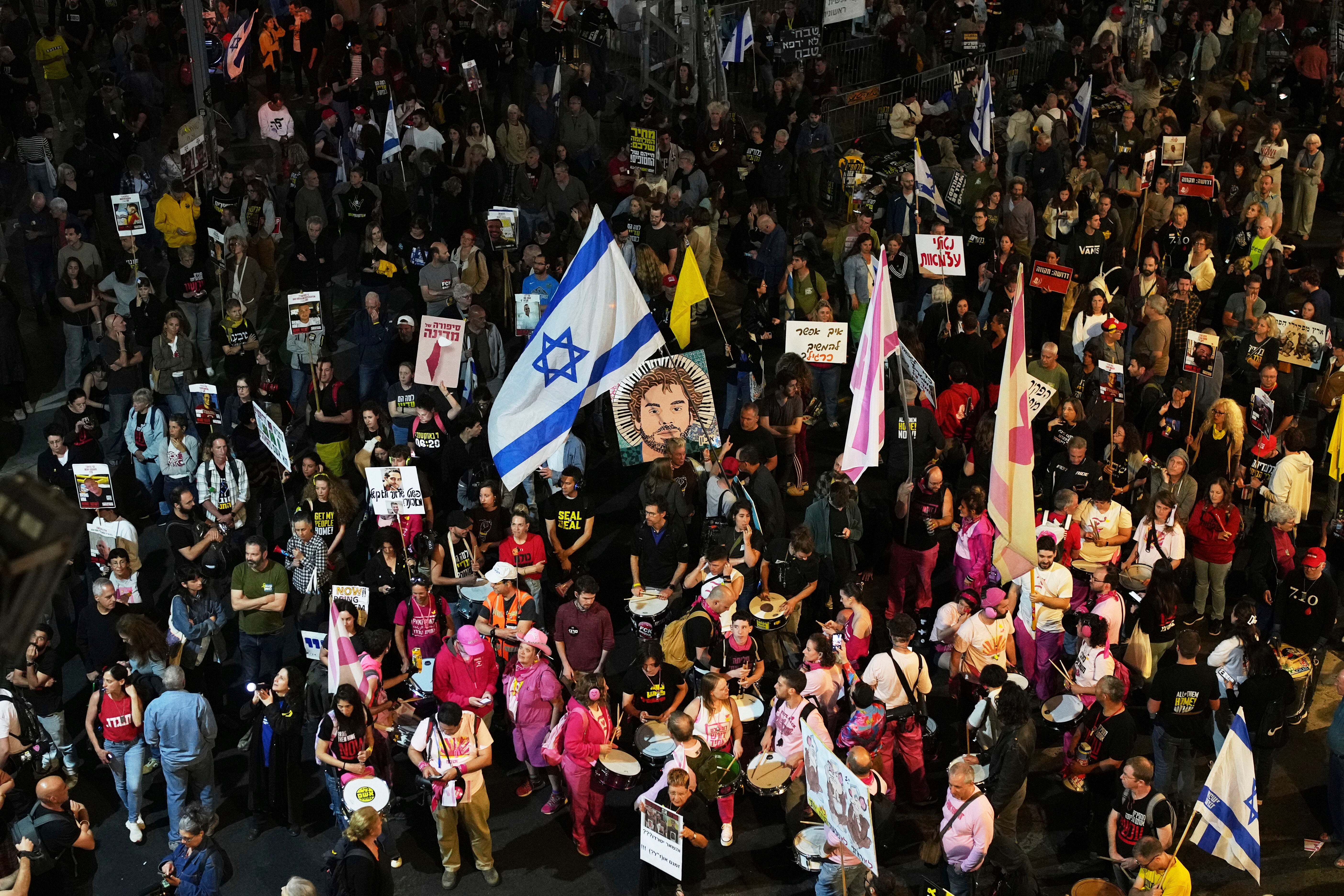 People take part in a protest demanding the immediate release of hostages held by Hamas in the Gaza Strip, in Tel Aviv, Israel, on Saturday, 26 April 2025