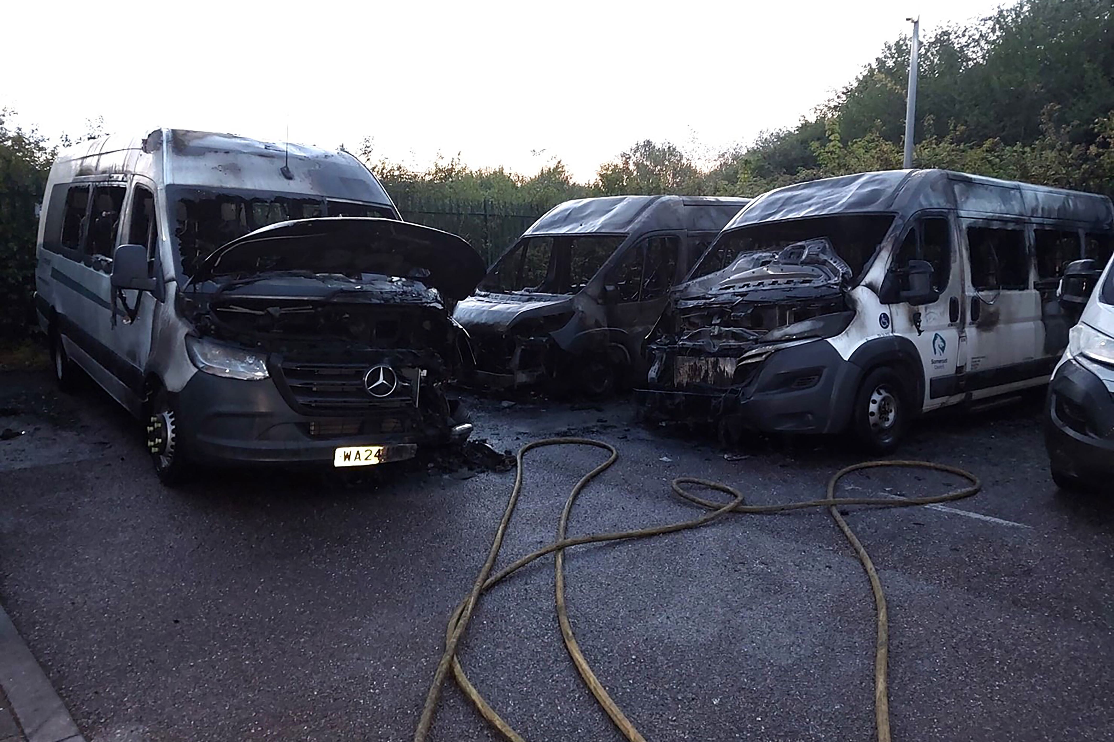 Some of the seven specially-adapted minibuses used by disabled people and school children belonging to Somerset Council, which were destroyed in a fire
