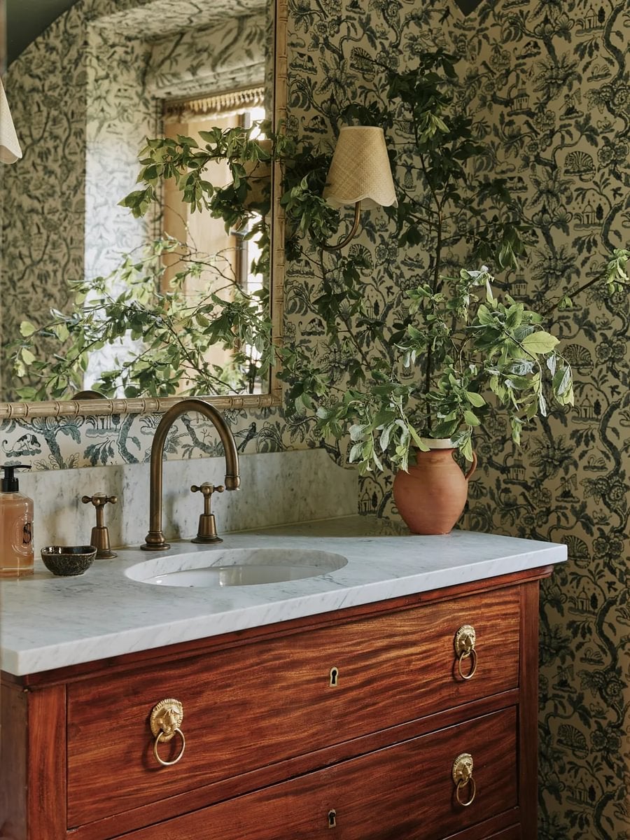 The key is to be creative, blending high-quality furnishings with affordable finds