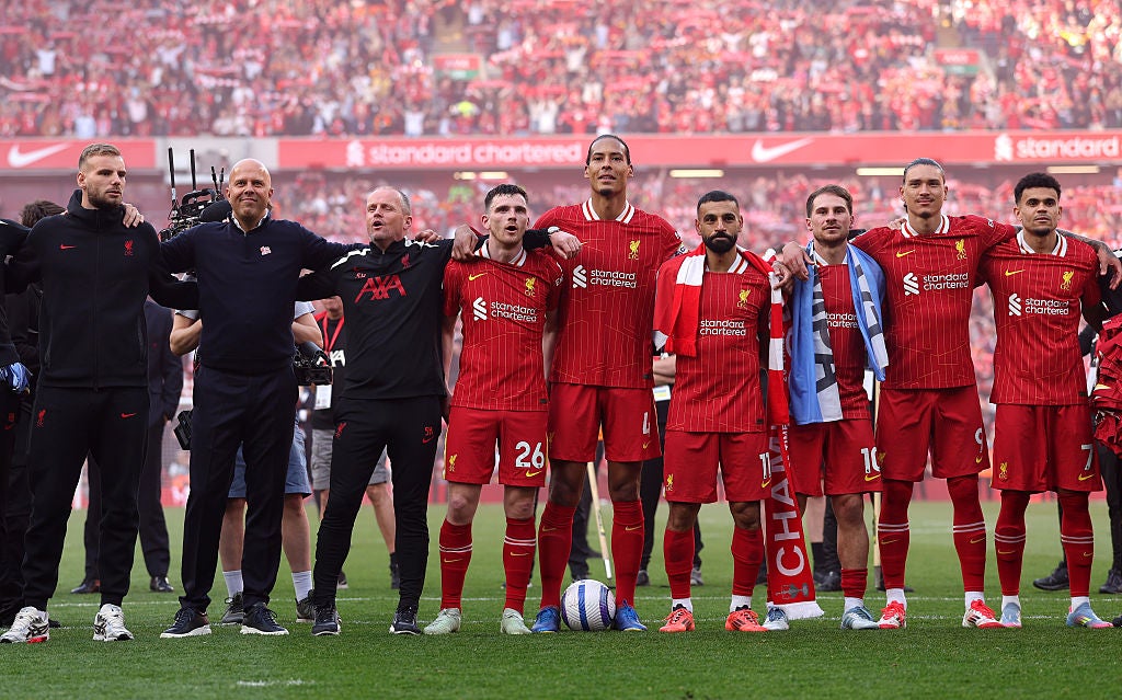 Slot celebrates Liverpool’s title win in front of the Kop with his team