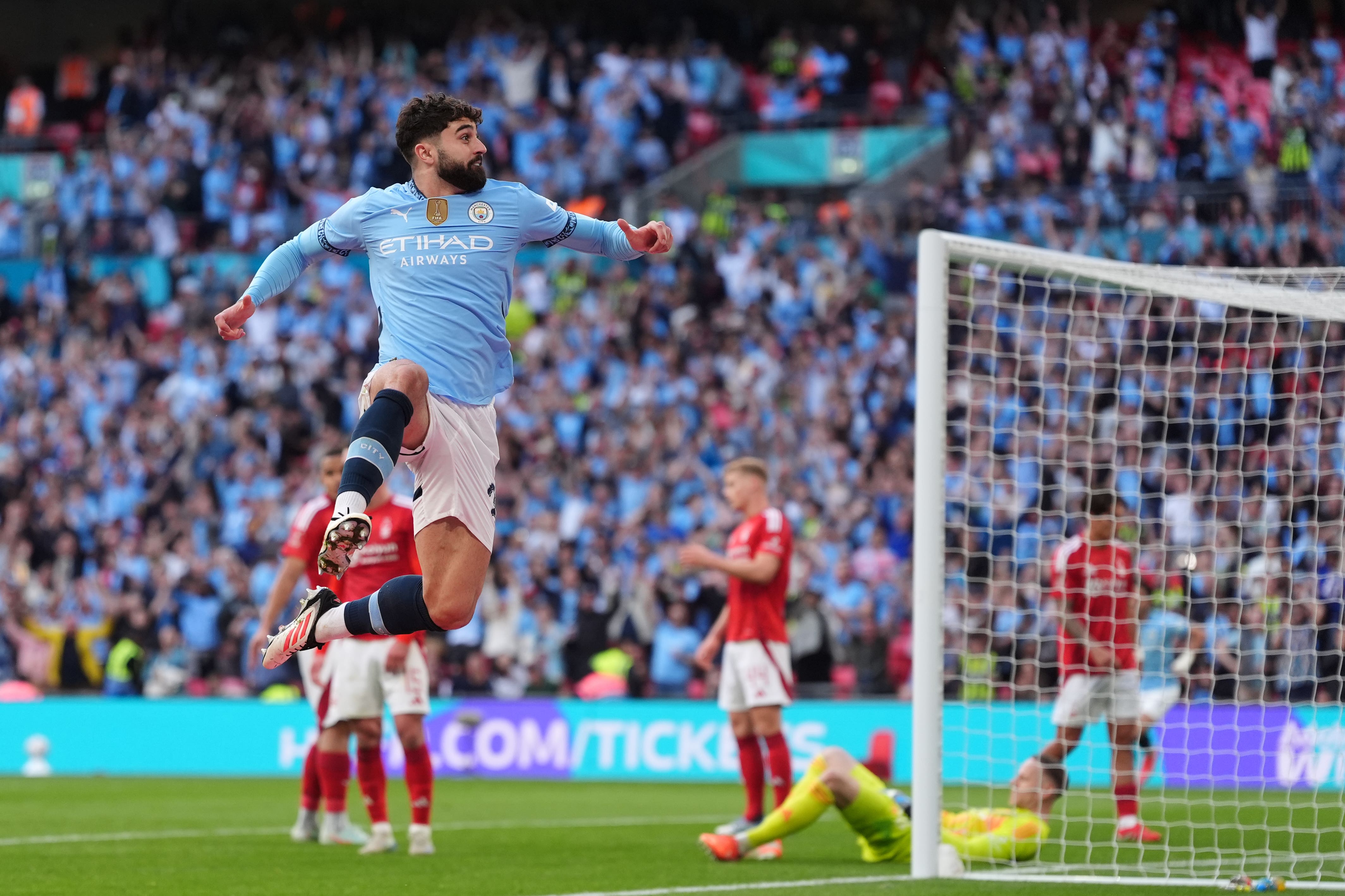 Josko Gvardiol celebrates after scoring for Man City
