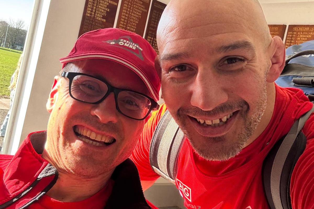 Alex Gibson, left, walked the final 356 metres of the London marathon on Sunday (Challenging MND/PA)