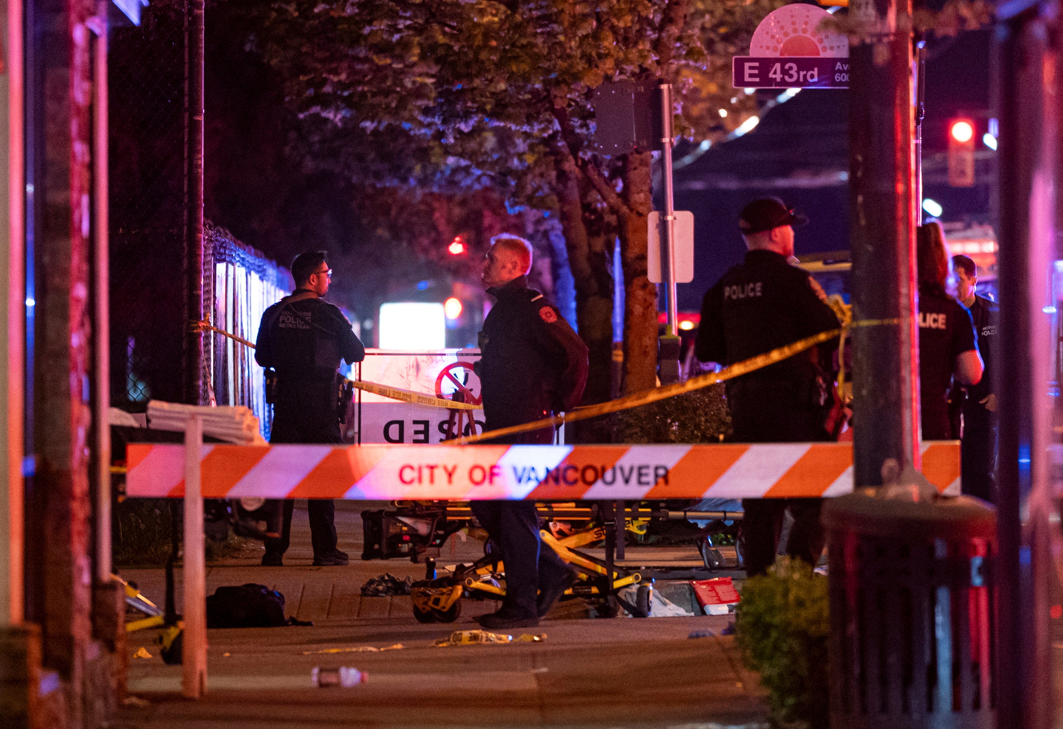 Police secure the scene after a car drove into a crowd at the Lapu Lapu festival in Vancouver