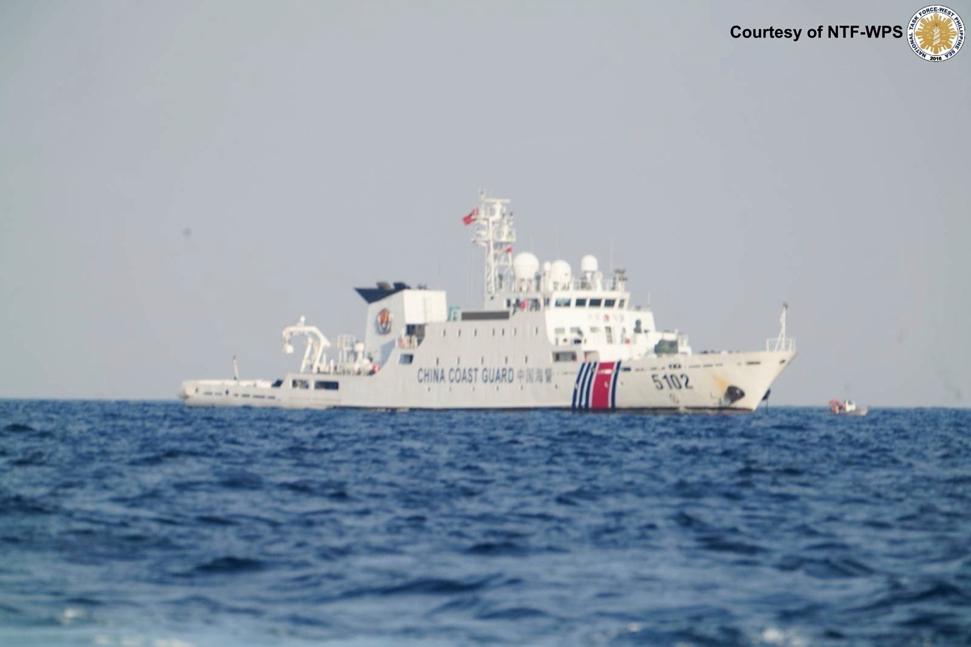 Chinese coast guard ship patrols near Sandy Cay 2 in the South China Sea on Sunday