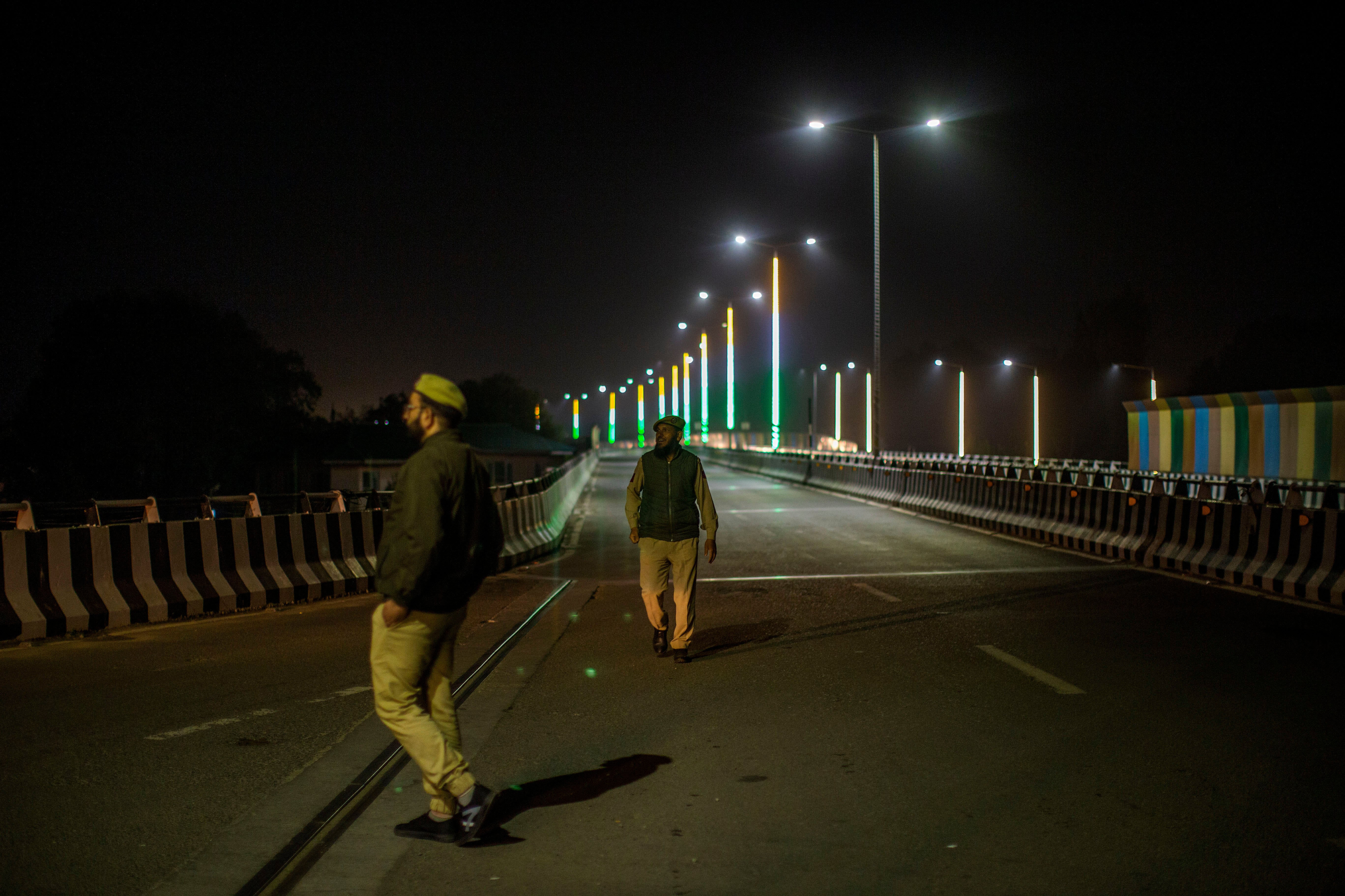 Representative. Indian policemen patrolling and managing traffic