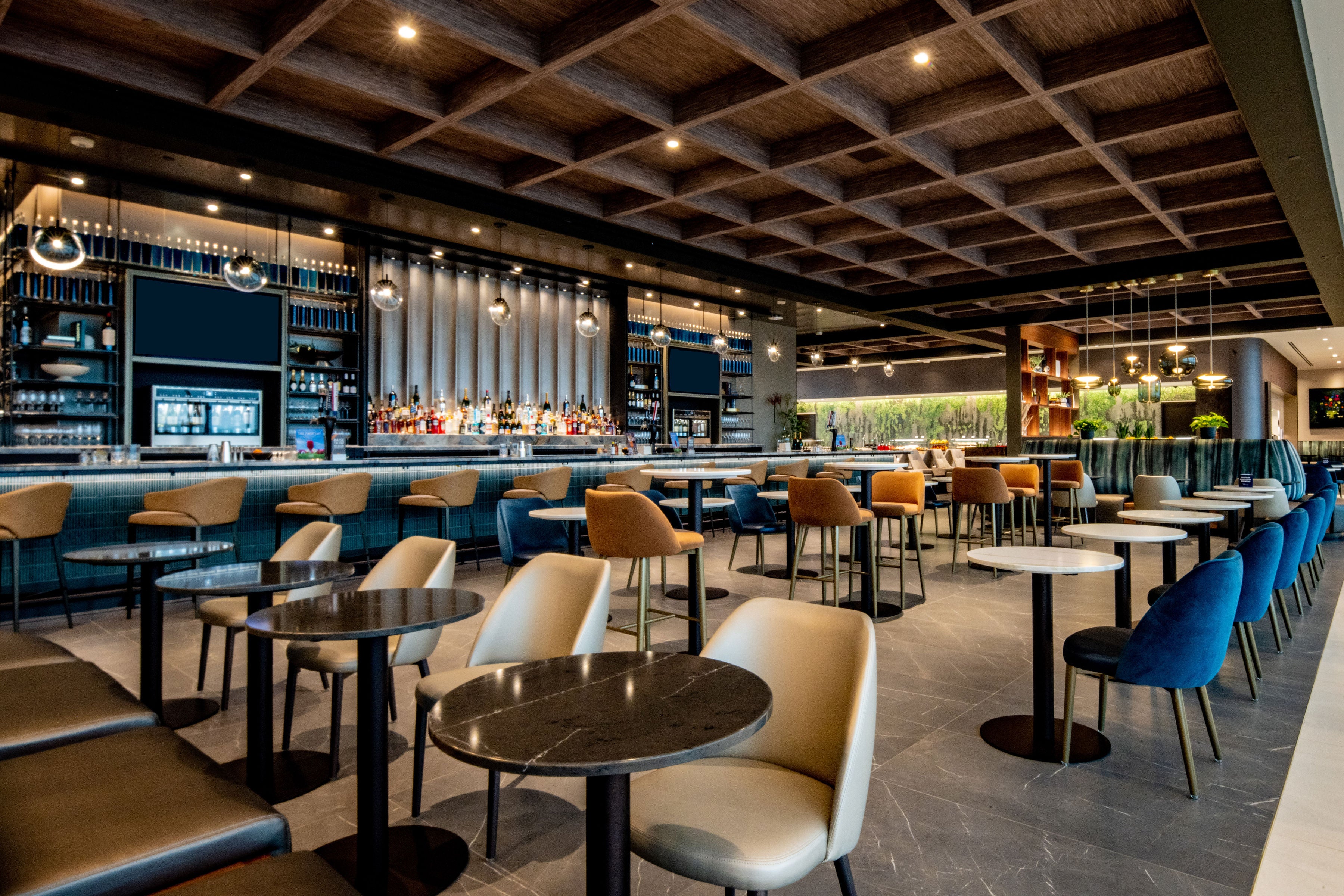 Soccer field-sized airport lounge opens at world’s busiest airport