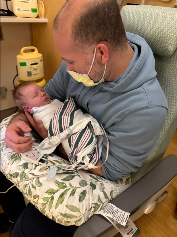 Tim Groth and his newborn son, Cole. The Long Island, New York couple agreed to the routine procedure, but claim no one ever told them that circumcision presented a serious bleeding risk for babies with congenital heart disease