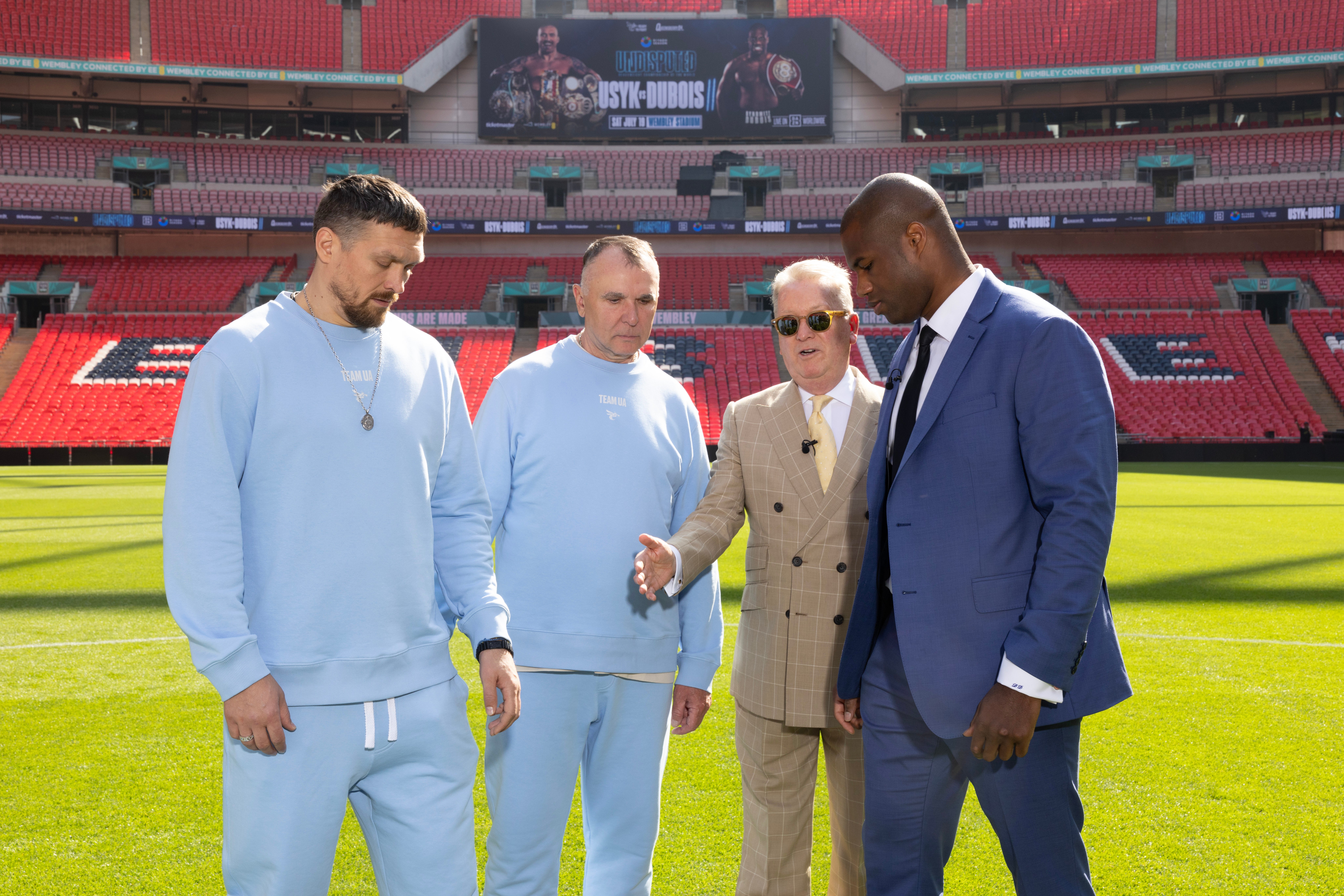 Left to right: Oleksandr Usyk, promoters Egis Klimas and Frank Warren, and Daniel Dubois