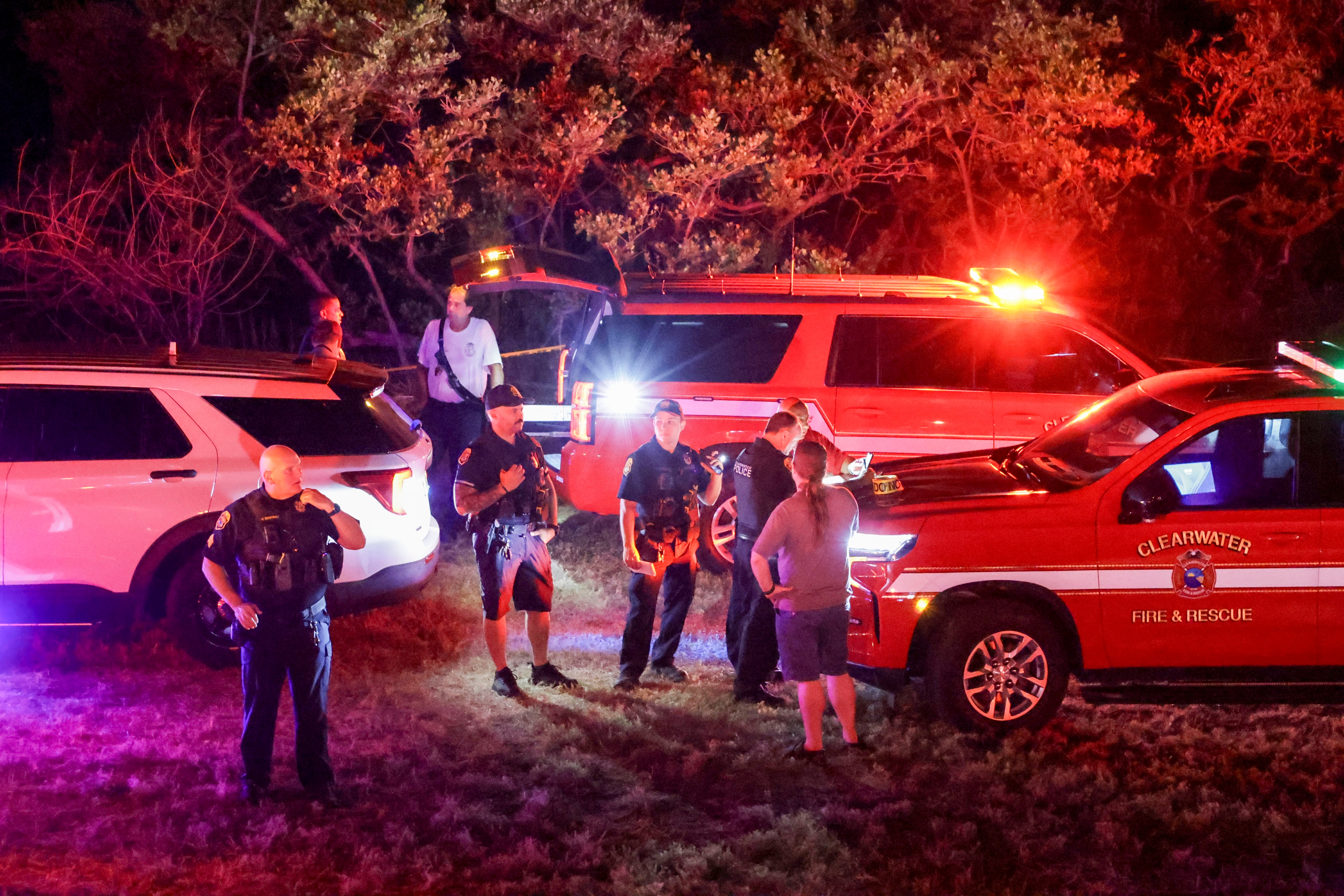First responders gather on a beach near where a boat crashed into the ferry causing multiple injuries near the Clearwater Memorial Causeway Bridge, on Sunday, 27 April 2025, in Clearwater, Florida