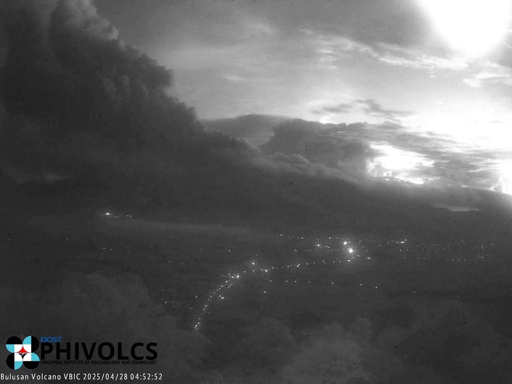 A handout photo made available by the Philippine Institute of Volcanology and Seismology (PHIVOLCS) shows ash and smoke rising from the Bulusan volcano in Sorsogon province, Philippines, 28 April 2025