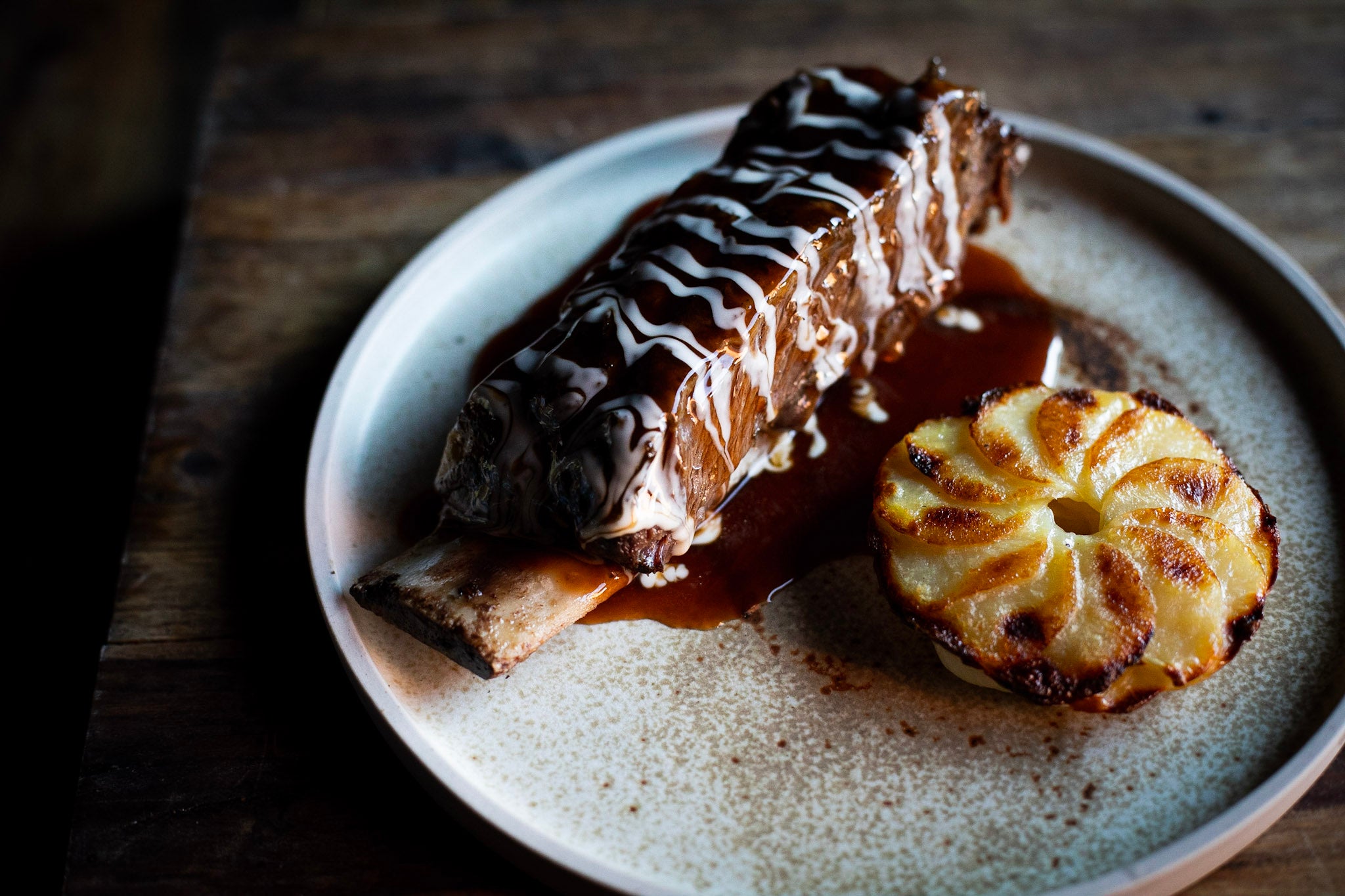 Cooked low and slow, then hit with fire for a smoky caramelised crust – barbecue at its most indulgent