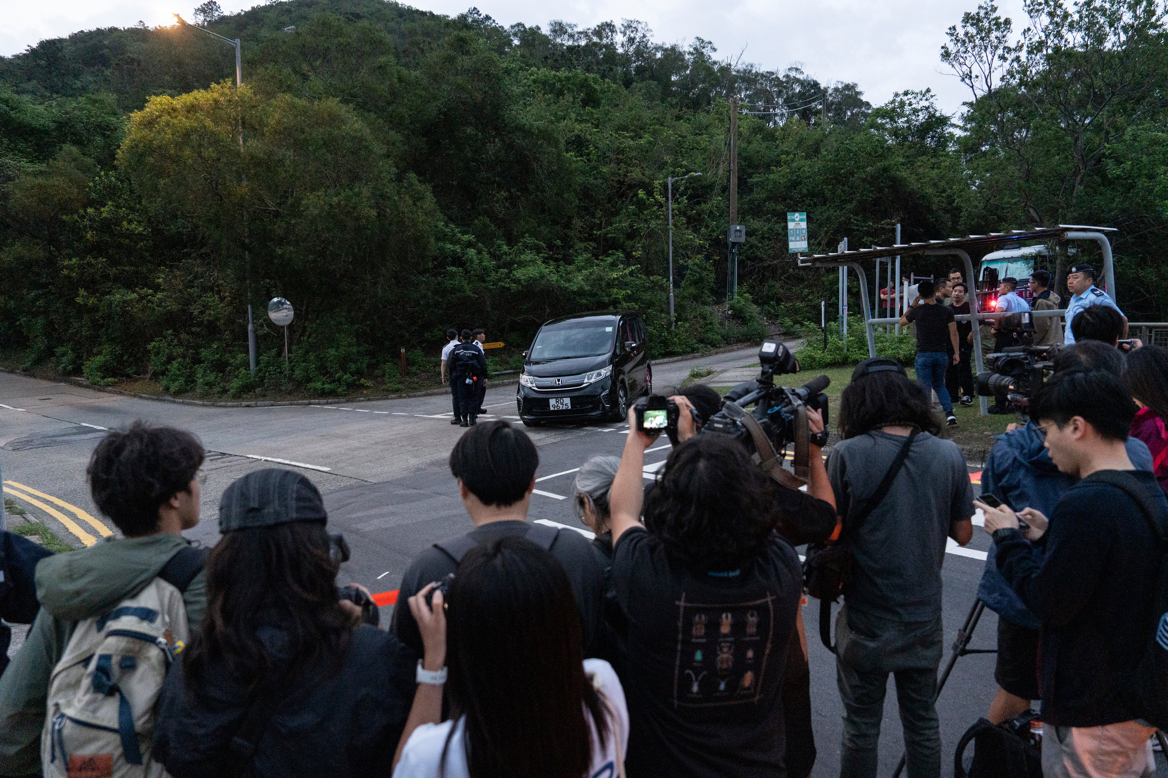 Members of media wait outside the Shek Pik Prison as former pro-democracy lawmaker, Gary Fan, was released after four years for his conviction under the national security law in Hong Kong, Tuesday, 29 April 2025
