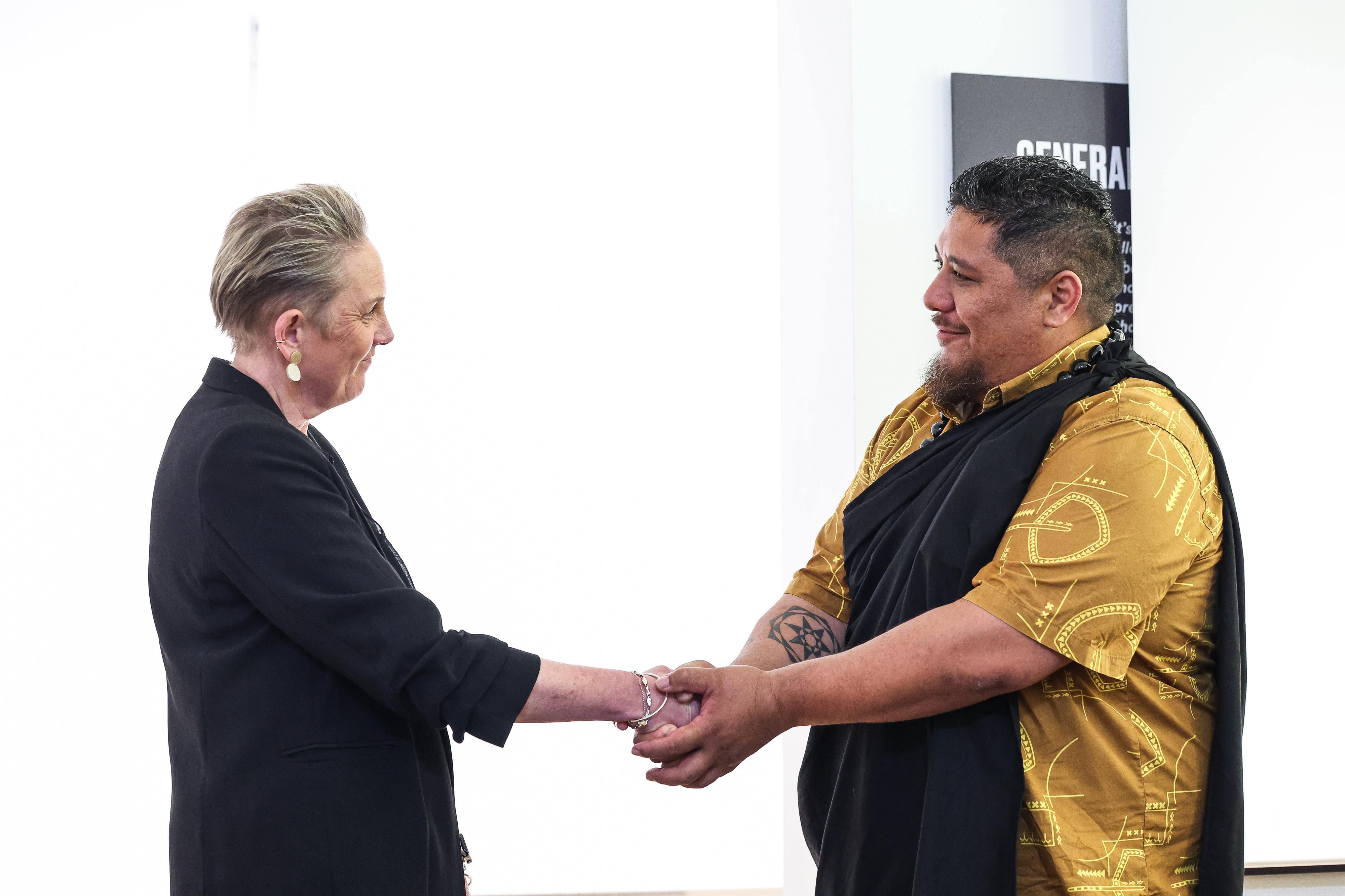 Pictured at the repatriation ceremony are (L-R) Kathryn Thomson, chief executive of National Museums NI and Kuike Kamakea-Ohelo from the Office of Hawaiian Affairs (William Cherry/Presseye/PA)