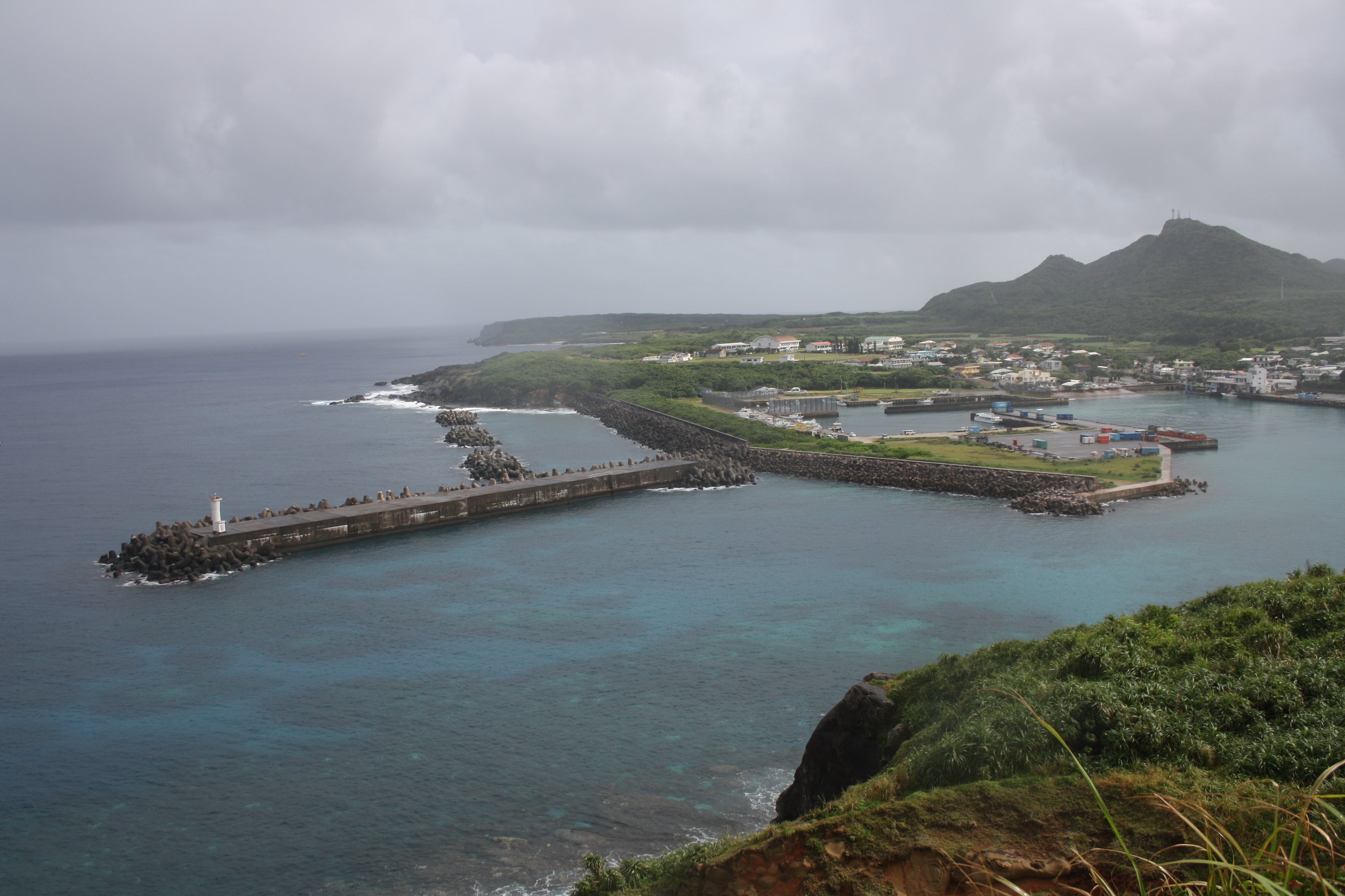 The view of Yonaguni island’s main fishing port from a lighthouse marking the westernmost point in all of Japan