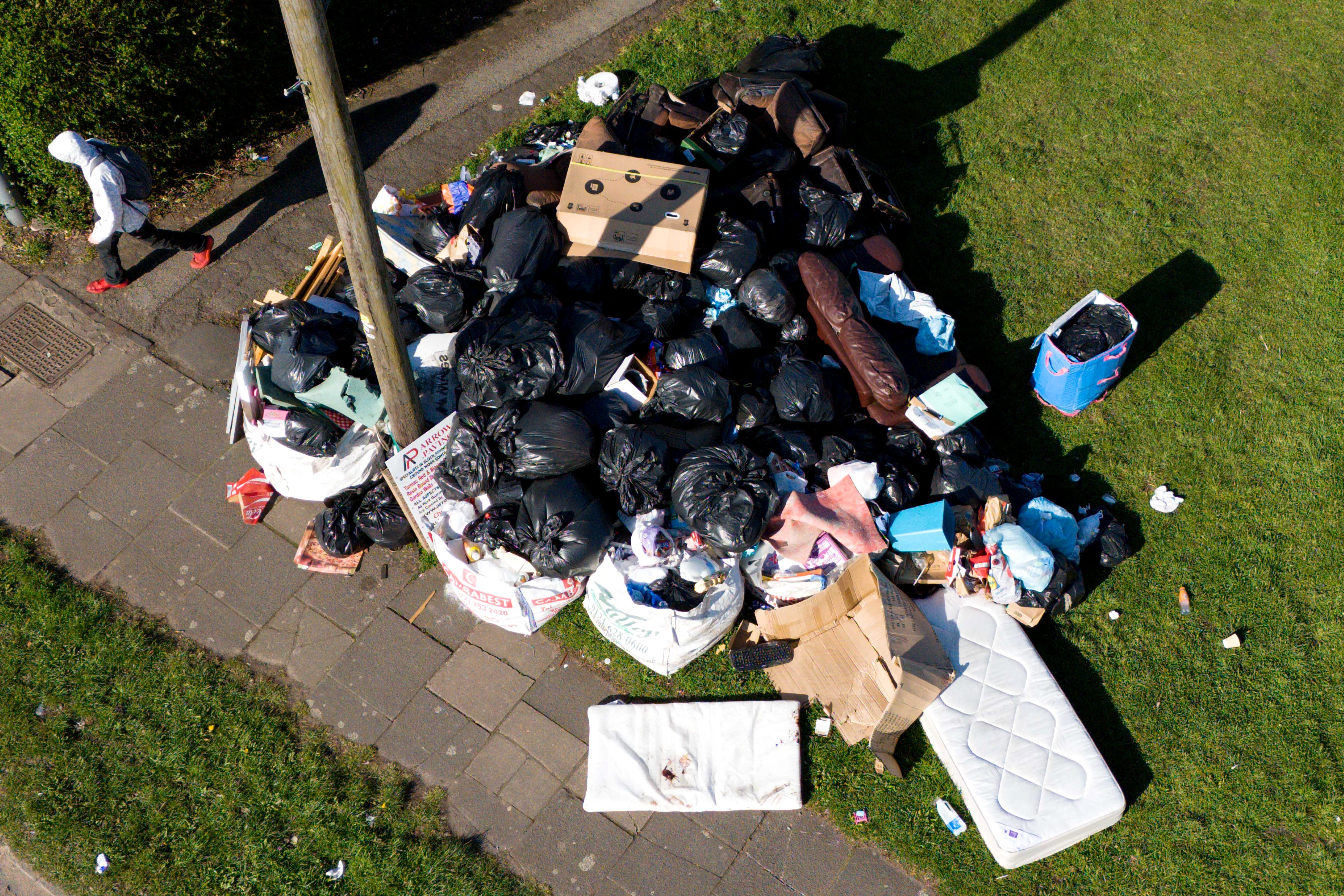 An aerial view of furniture and uncollected refuse bags in Yardley, east Birmingham, amid an ongoing refuse workers’ strike in Birmingham (Jacob King/PA)