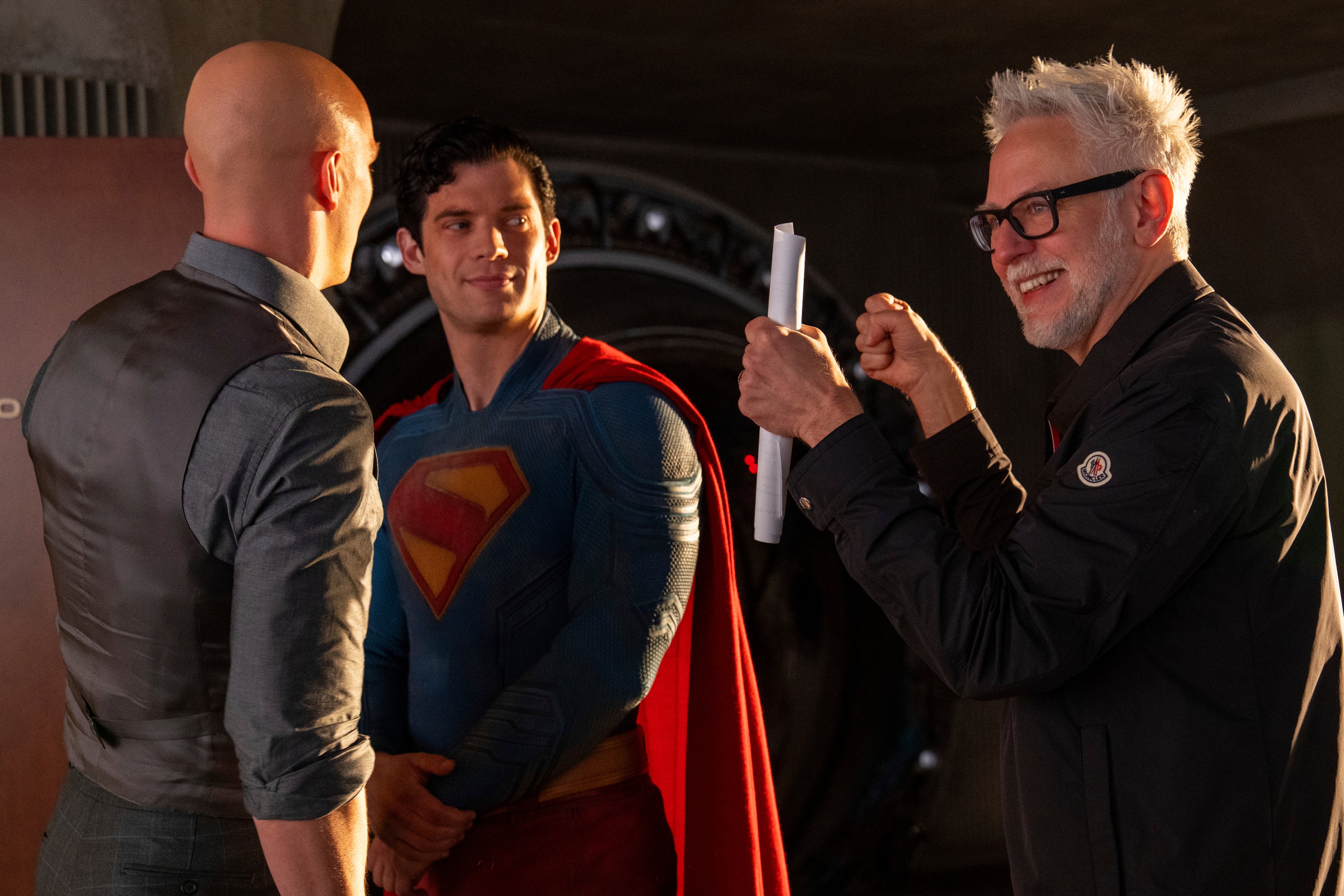 James Gunn (right) on set with Nicholas Hoult (left) and David Corenswet; The director has said that his Superman is the story of an “immigrant that came from other places” and of “basic human kindness”