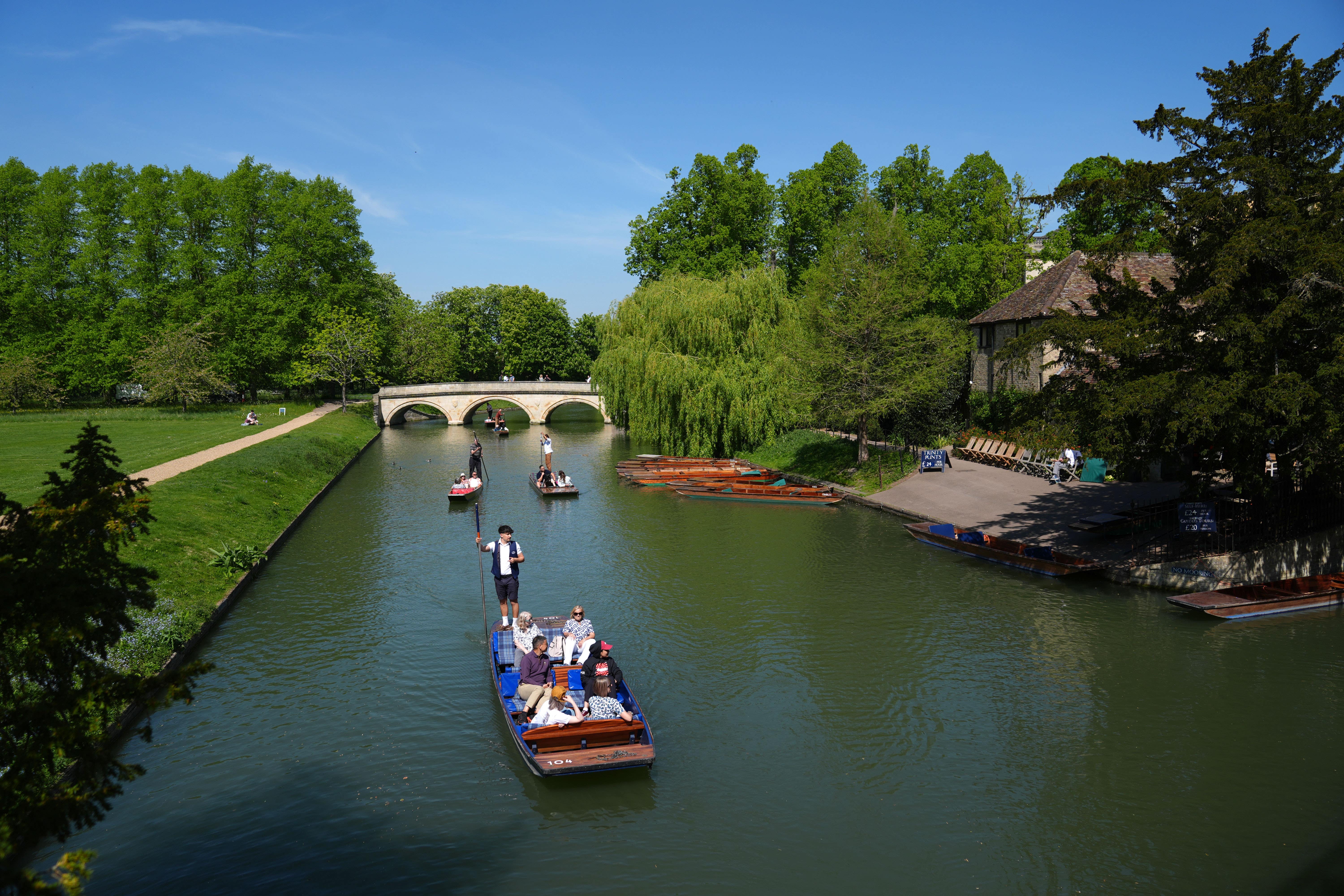 People punting along the River Cam in Cambridge, as the warm weather continues across the country with highs of 25C forecast (Joe Giddens / PA).