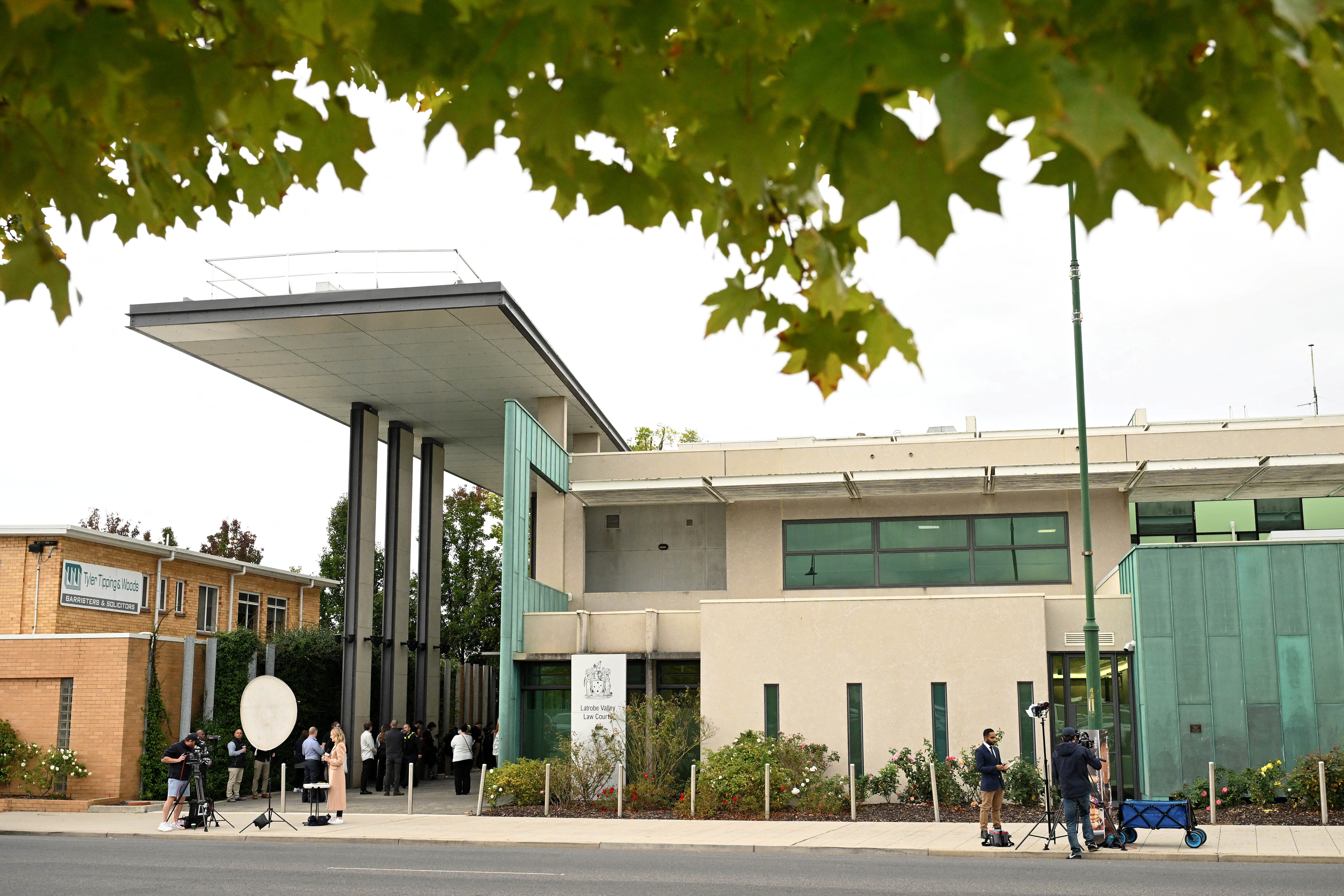 Media stand outside the Latrobe Valley Magistrates' Court in Morwell, Australia, 29 April 2025