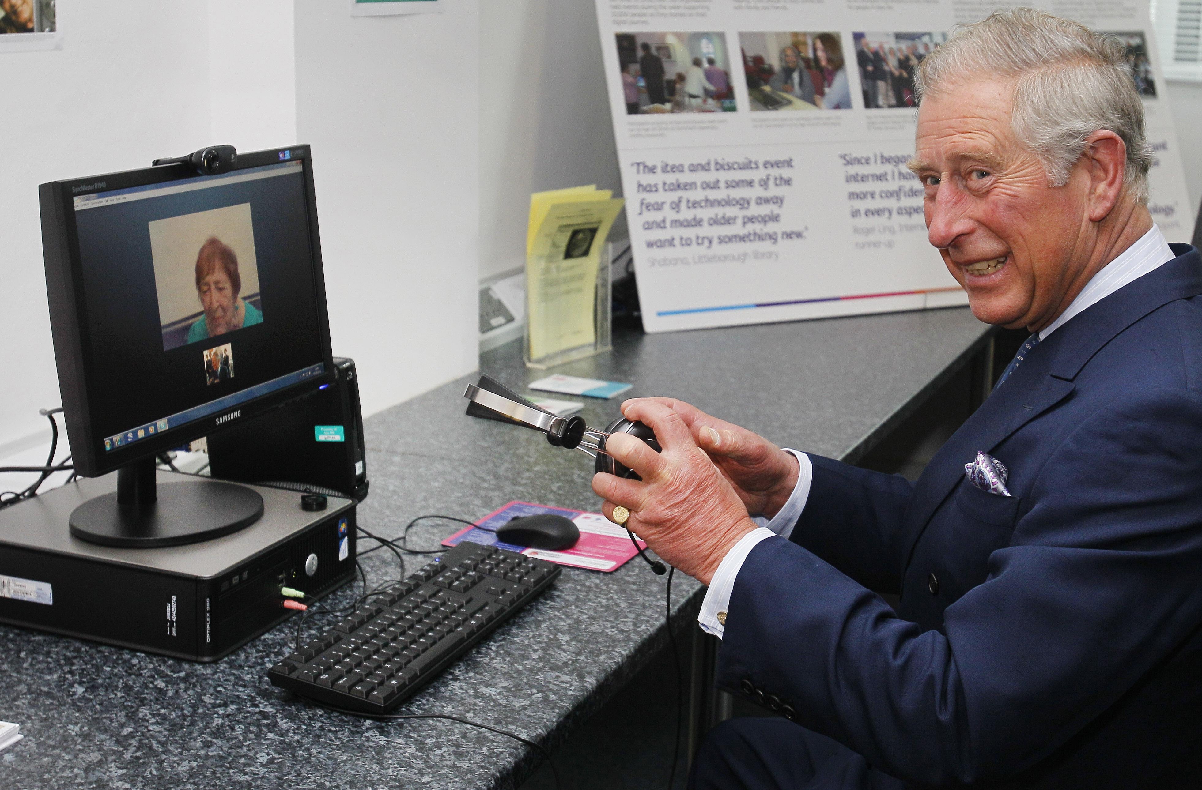Charles, then the Prince of Wales, tries his hand at using Skype in 2011